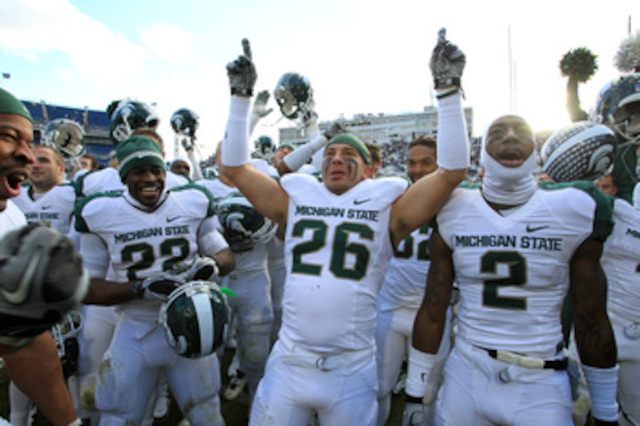 STATE COLLEGE, PA - NOVEMBER 27: Safety Jesse Johnson #26 of the Michigan State Spartans and his teammates celebrate their Big Ten championship after a game against the Penn State Nittany Lions on November 27, 2010 at Beaver Stadium in State College, Penn STATE COLLEGE, PA - NOVEMBER 27: Safety Jesse Johnson #26 of the Michigan State Spartans and his teammates celebrate their Big Ten championship after a game against the Penn State Nittany Lions on November 27, 2010 at Beaver Stadium in State College, Penn