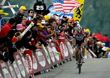 COURCHEVEL, FRANCE - JULY 12:  Carlos Sastre of Spain and Team CSC approaches the finish line during Stage 10 of the 92nd Tour de France between Grenoble and Courchevel July 12, 2005 in Courchevel, France.  (Photo by Bryn Lennon/Getty Images)