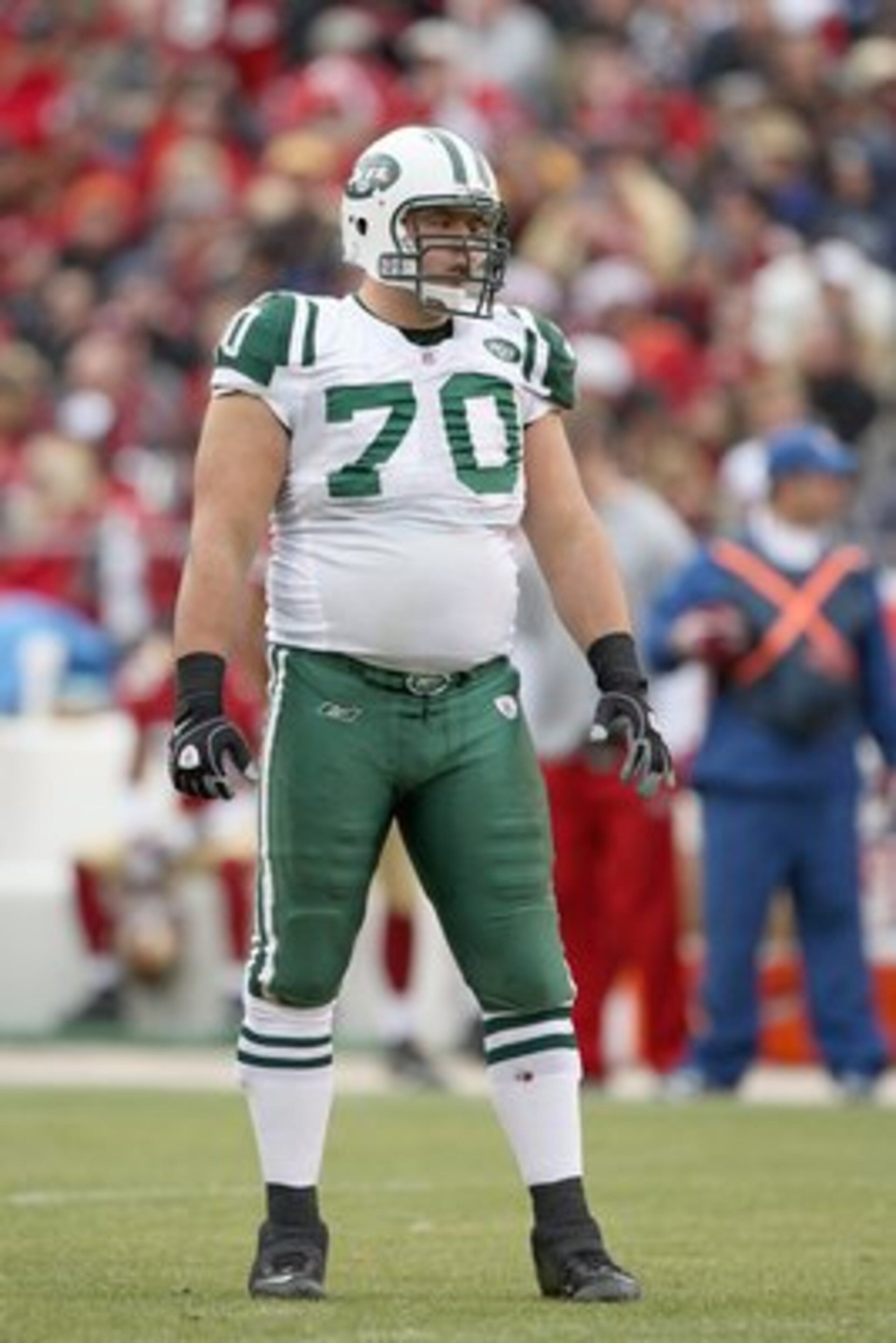 SAN FRANCISCO - DECEMBER 07:  Mike Devito #70 of the New York Jets stands on the field against the San Francisco 49ers during an NFL game on December 7, 2008 at Candlestick Park in San Francisco, California. (Photo by Jed Jacobsohn/Getty Images)