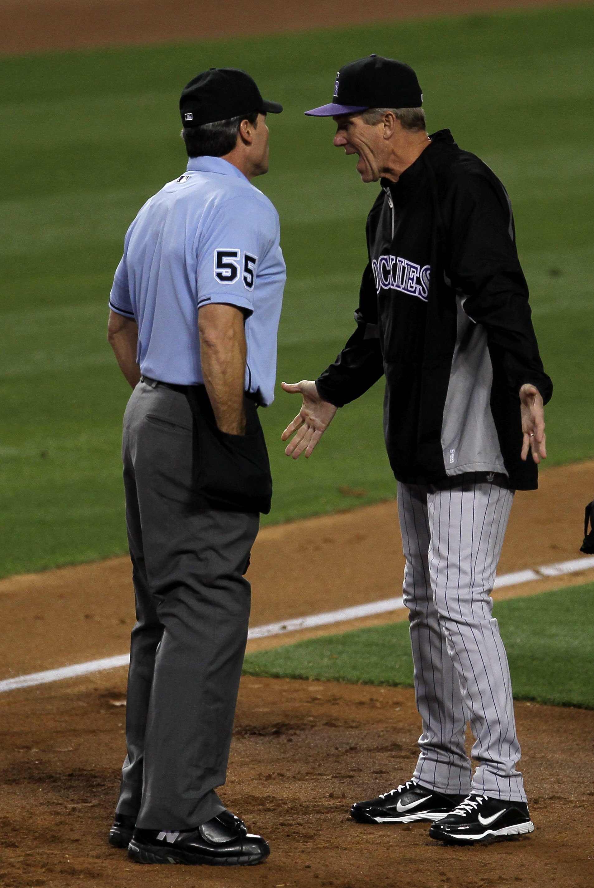 LOS ANGELES - MAY 31:  Manager Jim Tracy of the Colorado Rockies argues with home plate umpire Angel Hernandez after Casey Blake of the Los Angeles Dodgers wa called safe on a play at home plate in the third inning on May 31, 2011 at Dodger Stadium in Los