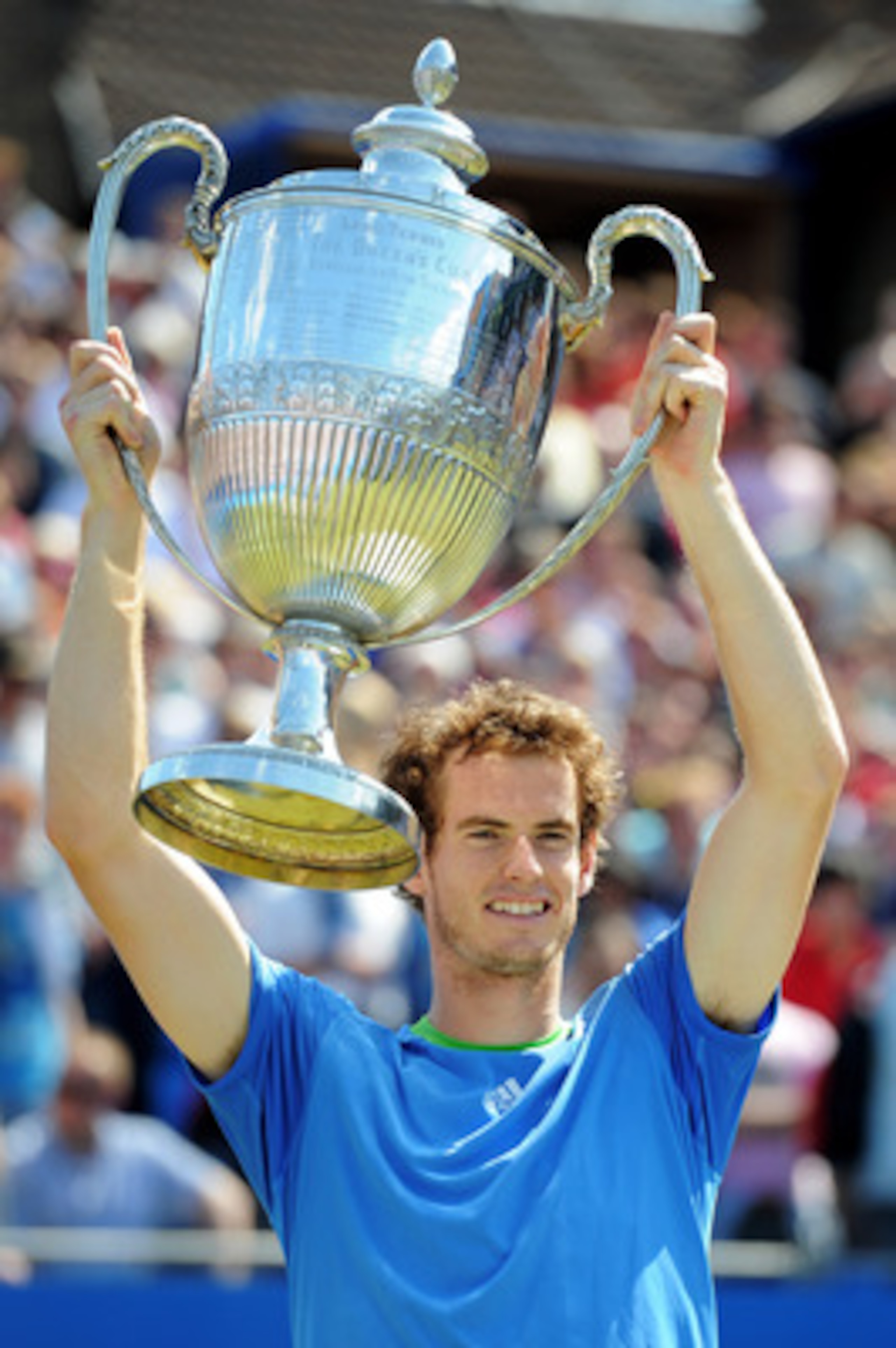 LONDON, ENGLAND - JUNE 13:  Andy Murray of Great Britain celebrates winning his Men's Singles final against Jo-Wilfred Tsonga of France on day eight of the AEGON Championships at Queens Club on June 13, 2011 in London, England.  (Photo by Michael Regan/Ge