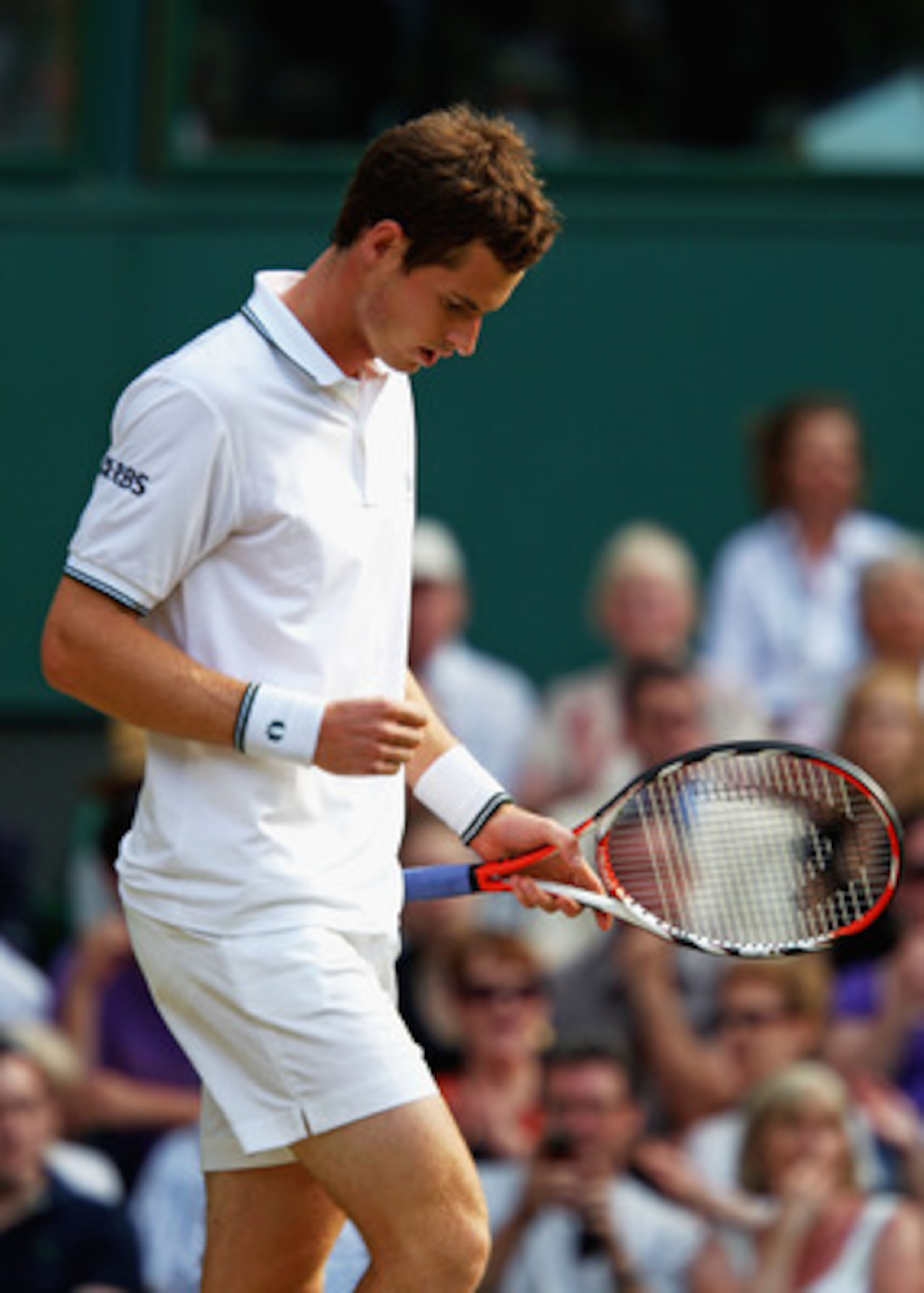 WIMBLEDON, ENGLAND - JUNE 25:  Andy Murray of Great Britain looks focused during the men's singles second round match against Ernests Gulbis of Latvia on Day Four of the Wimbledon Lawn Tennis Championships at the All England Lawn Tennis and Croquet Club o