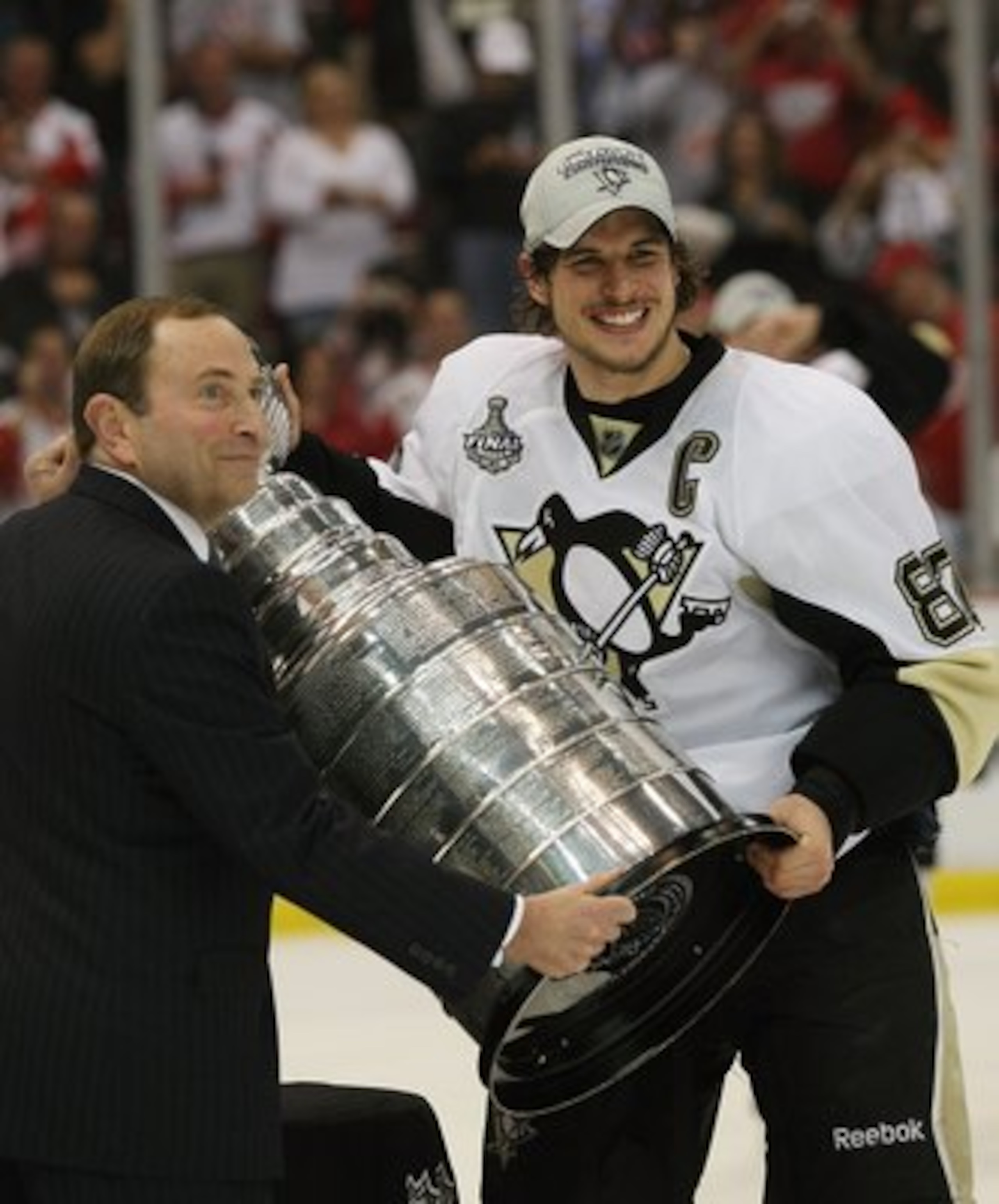 DETROIT - JUNE 12: Sidney Crosby #87 of the Pittsburgh Penguins celebrates with the Stanley Cup following the Penguins victory over the Detroit Red Wings in Game Seven of the 2009 NHL Stanley Cup Finals at Joe Louis Arena on June 12, 2009 in Detroit, Mich
