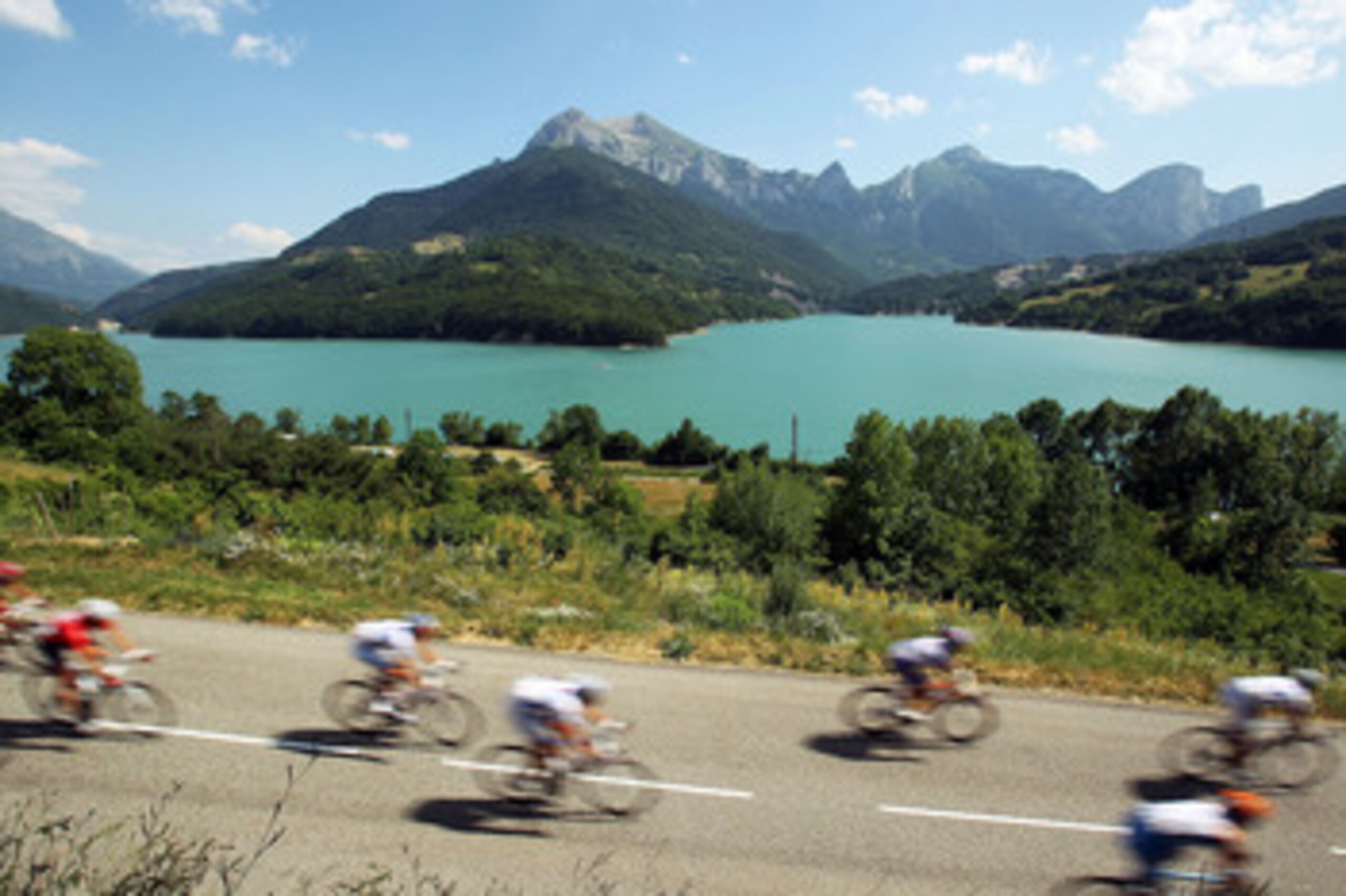 GAP, FRANCE - JULY 14: Riders make their way along the 179km Stage 10 of the Tour de France on July 14, 2010 in Gap, France. The route from Chambery to Gap features a number of climbs including the category one Cote de Laffrey. Sergio Paulinho of Portugal
