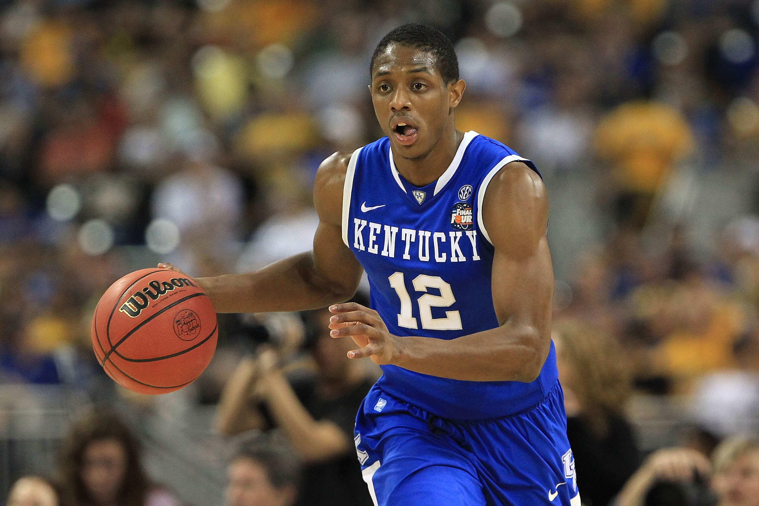 HOUSTON, TX - APRIL 02:  Brandon Knight #12 of the Kentucky Wildcats moves the ball while taking on the Connecticut Huskies during the National Semifinal game of the 2011 NCAA Division I Men's Basketball Championship at Reliant Stadium on April 2, 2011 in