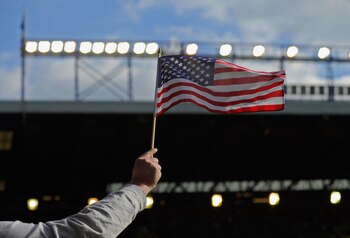 LIVERPOOL, ENGLAND - OCTOBER 17: An Everton fan waves an American flag during the Barclays Premier League match between Everton and Liverpool at Goodison Park on October 17, 2010 in Liverpool, England.  (Photo by Michael Regan/Getty Images)
