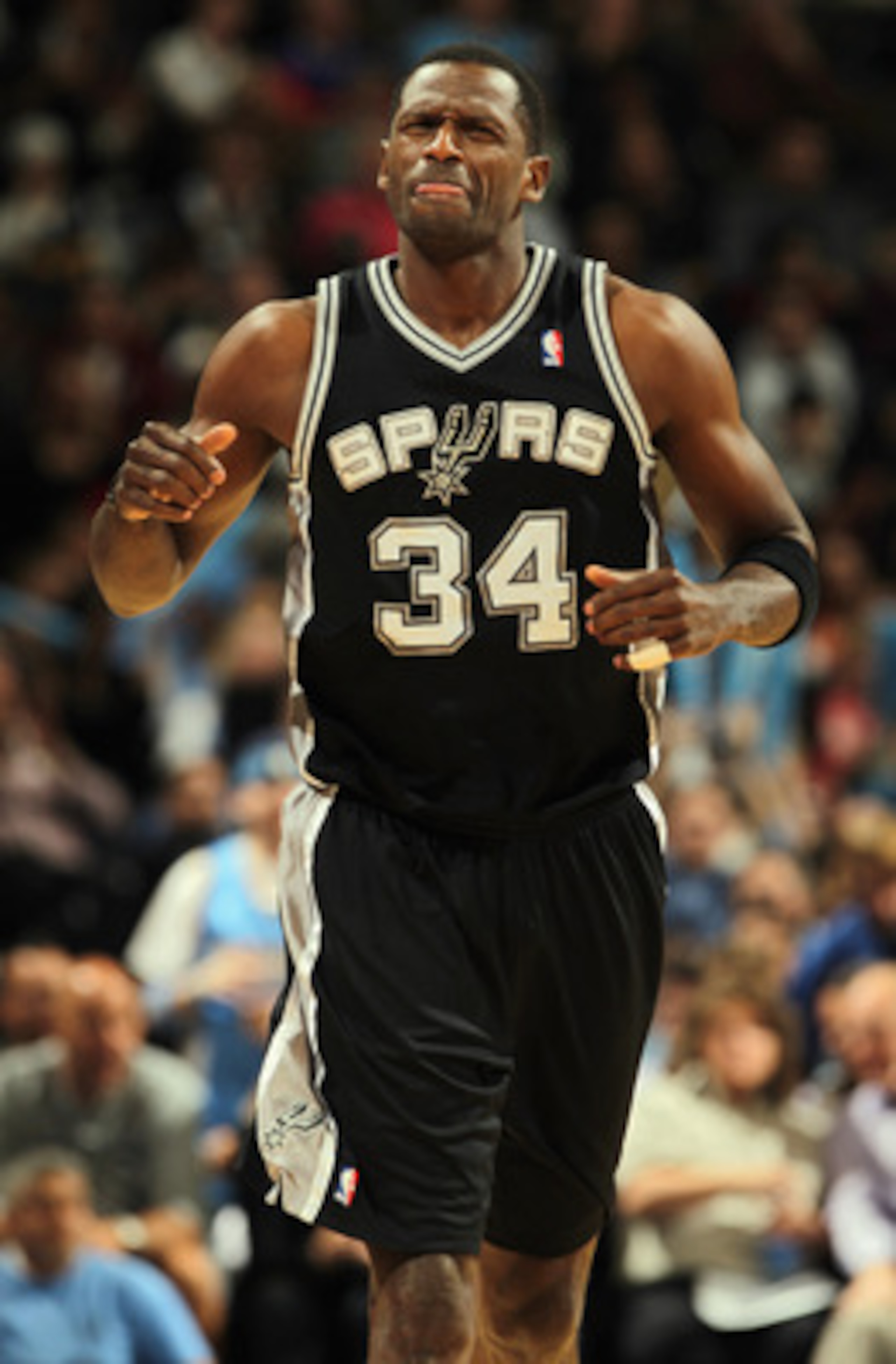 DENVER, CO - MARCH 23:  Antonio McDyess #34 of the San Antonio Spurs reacts after being called for a foul against the Denver Nuggets at the Pepsi Center on March 23, 2011 in Denver, Colorado. McDyess went on to foul out of the game as the Nuggets defeated