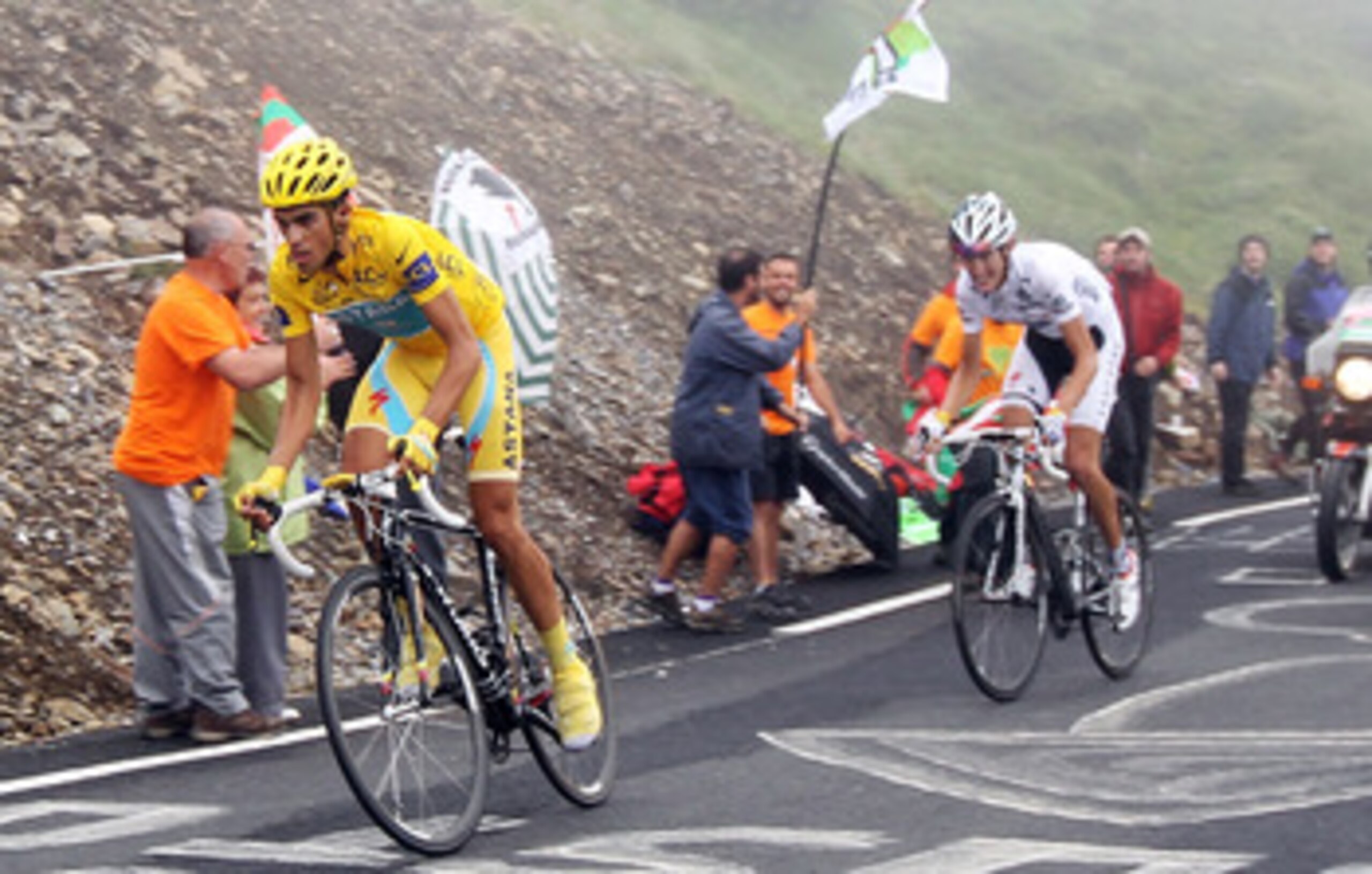 COL DU TOURMALET, FRANCE - JULY 22:  Alberto Contador of Spain and the Astana Team leads Andy Schleck of Luxembourg and Team Saxo Bank as he attacks up the slopes of the Col du Tourmalet during stage seventeen of the 2010 Tour de France from Pau to Col du