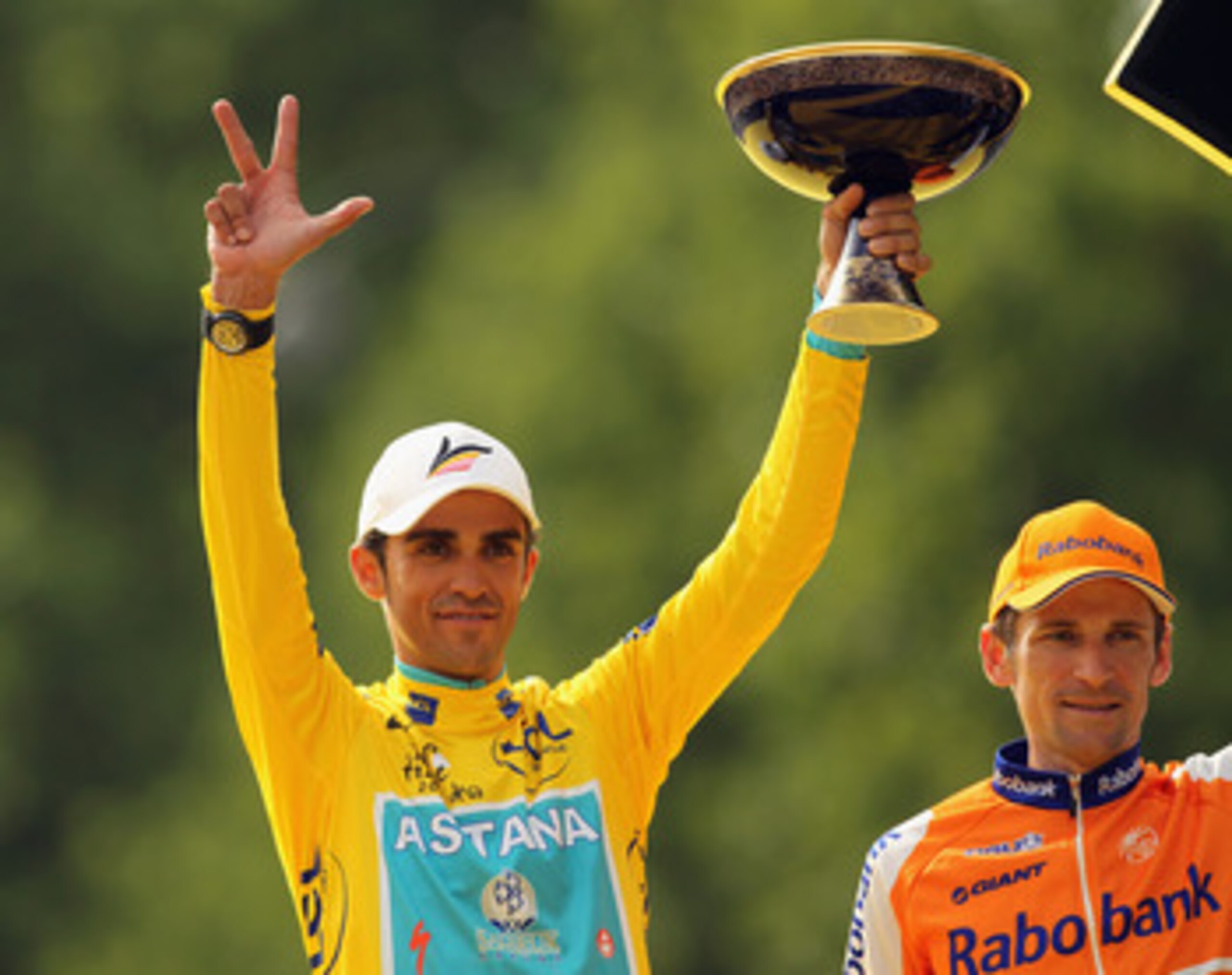 PARIS - JULY 25:  Alberto Contador of team Astana (L) celebrates on the podium after the twentieth and final stage of Le Tour de France 2010, from Longjumeau to the Champs-Elysees in Paris on July 25, 2010 in Paris, France.  (Photo by Spencer Platt/Getty 