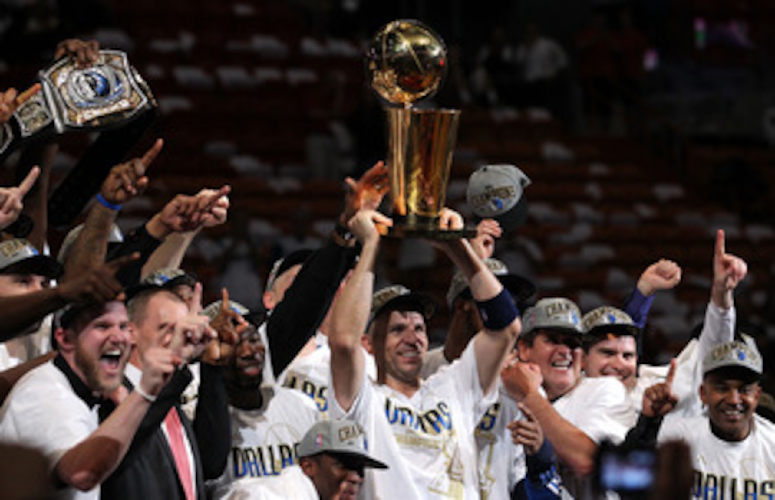 MIAMI, FL - JUNE 12:  Jason Kidd #2 of the Dallas Mavericks holds the Larry O'Brien trophy after the Mavericks won 105-95 against the Miami Heat in Game Six of the 2011 NBA Finals at American Airlines Arena on June 12, 2011 in Miami, Florida. NOTE TO USER