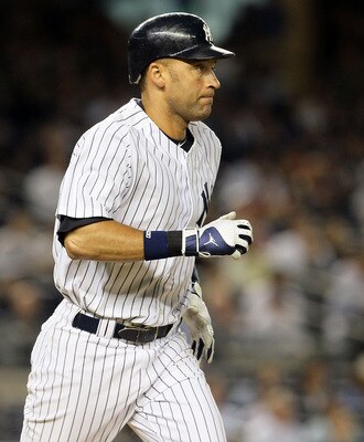 NEW YORK, NY - JUNE 13:  Derek Jeter #2 of the New York Yankees runs as he flies out in the fifth inning against the Cleveland Indians on June 13, 2011 at Yankee Stadium in the Bronx borough of New York City. Jeter suffered a sore right calf on the play a