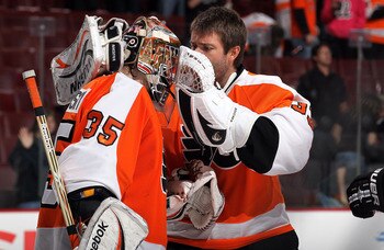 PHILADELPHIA - OCTOBER 26:  Sergei Bobrovsky #35 of the Philadelphia Flyers celebrates with teammate  #33 after defeating the Buffalo Sabres on October 26, 2010 at Wells Fargo Center in Philadelphia, Pennsylvania. The Flyers defeated the Sabres 6-3.  (Pho