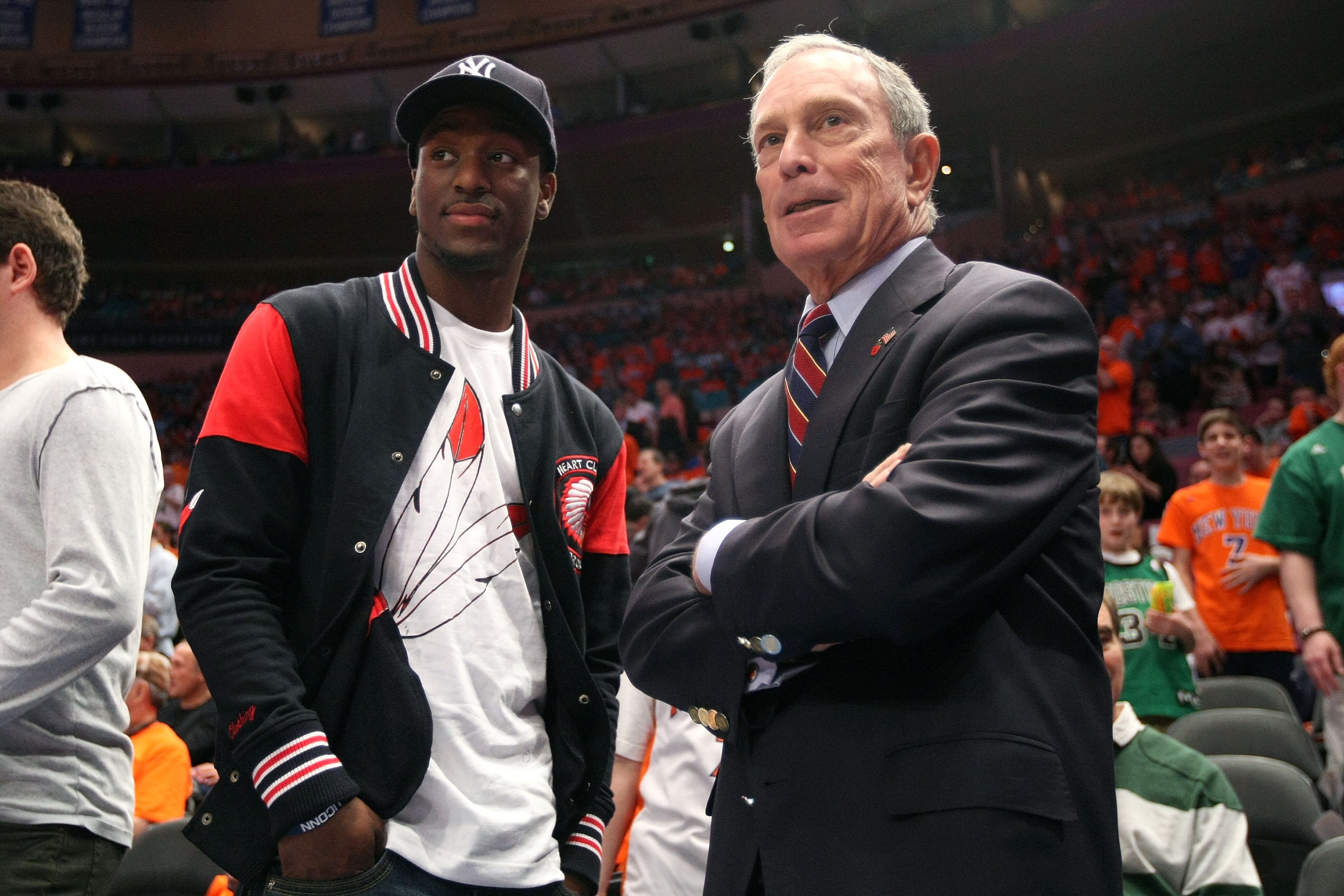 NEW YORK, NY - APRIL 24:  NBA draft prospect Kemba Walker from the University of Connecticut Huskies and New York City Mayor Michael Bloomberg watch the New York Knicks play against the Boston Celtics in Game Four of the Eastern Conference Quarterfinals d