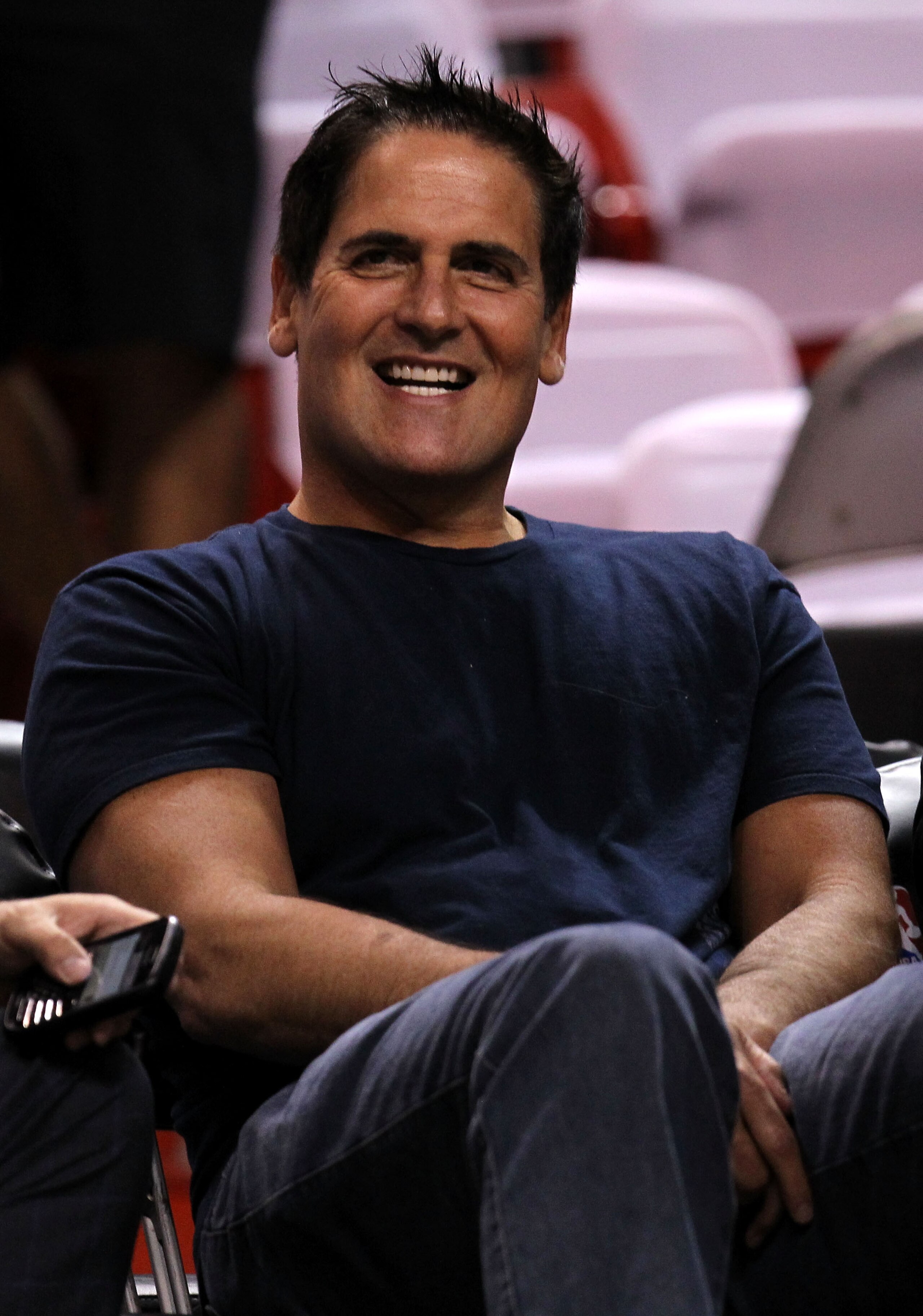 MIAMI, FL - JUNE 12: Owner Mark Cuban of the Dallas Mavericks smiles as he sits courtside before Game Six of the 2011 NBA Finals against the Miami Heat at American Airlines Arena on June 12, 2011 in Miami, Florida. NOTE TO USER: User expressly acknowledg MIAMI, FL - JUNE 12: Owner Mark Cuban of the Dallas Mavericks smiles as he sits courtside before Game Six of the 2011 NBA Finals against the Miami Heat at American Airlines Arena on June 12, 2011 in Miami, Florida. NOTE TO USER: User expressly acknowledg