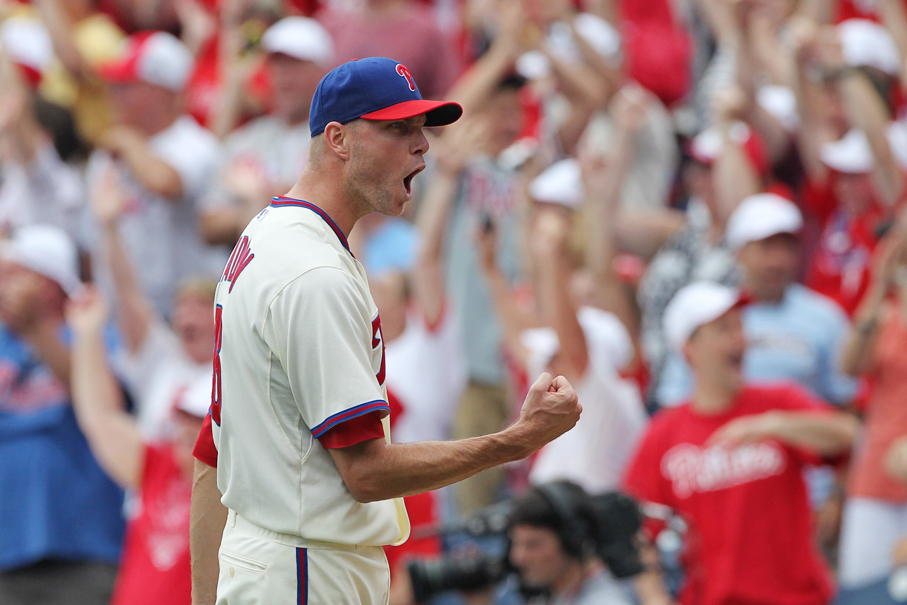 PHILADELPHIA - JUNE 12: Relief pitcher Ryan Madson #46 of the Philadelphia Phillies celebrates a save after winning a game against the Chicago Cubs at Citizens Bank Park on June 12, 2011 in Philadelphia, Pennsylvania. The Phillies won 4-3. (Photo by Hunte