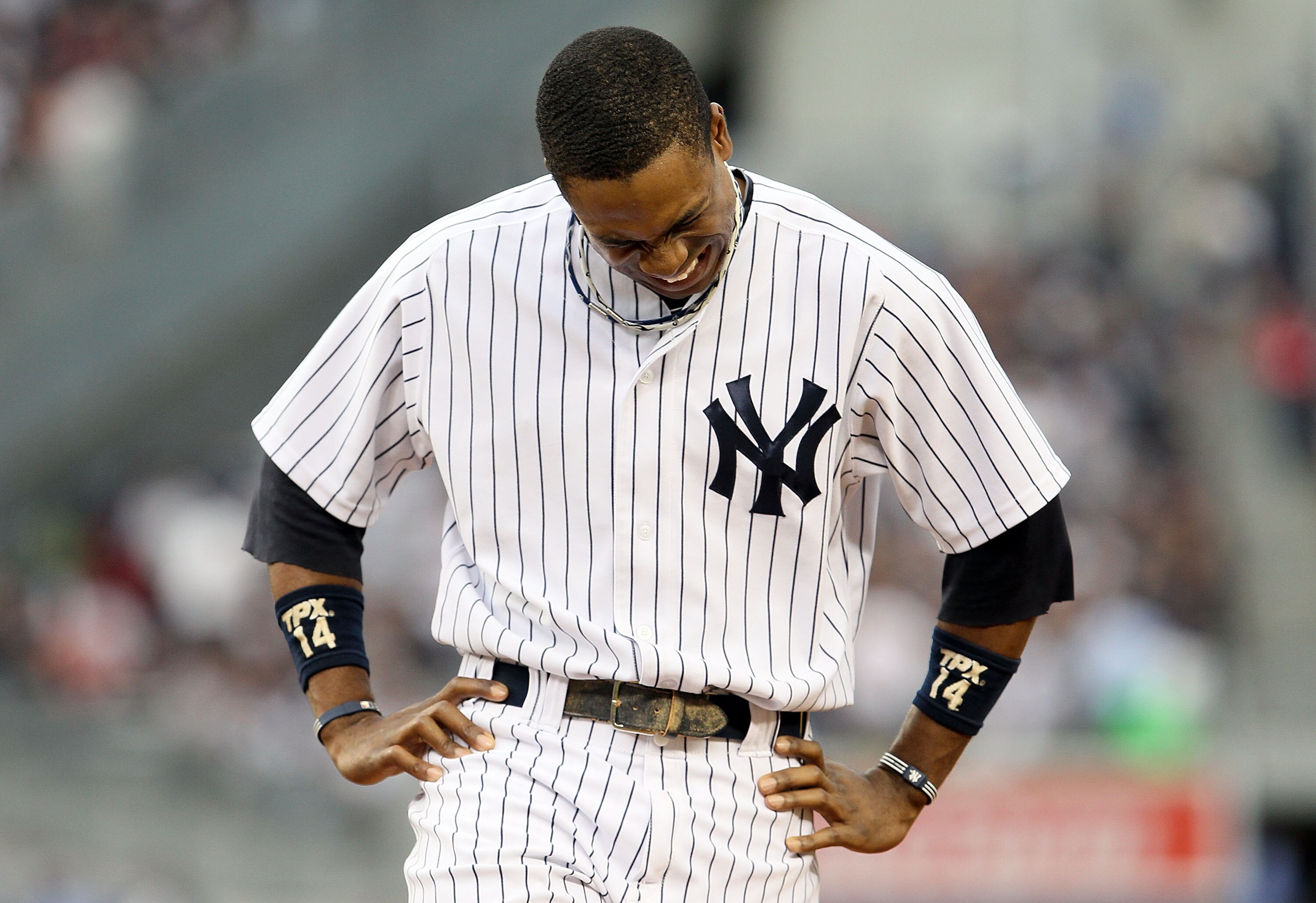 NEW YORK, NY - JUNE 13:  Curtis Granderson #14 of the New York Yankees looks on after flying out to end the second inning against the Cleveland Indians on June 13, 2011 at Yankee Stadium in the Bronx borough of New York City.  (Photo by Jim McIsaac/Getty