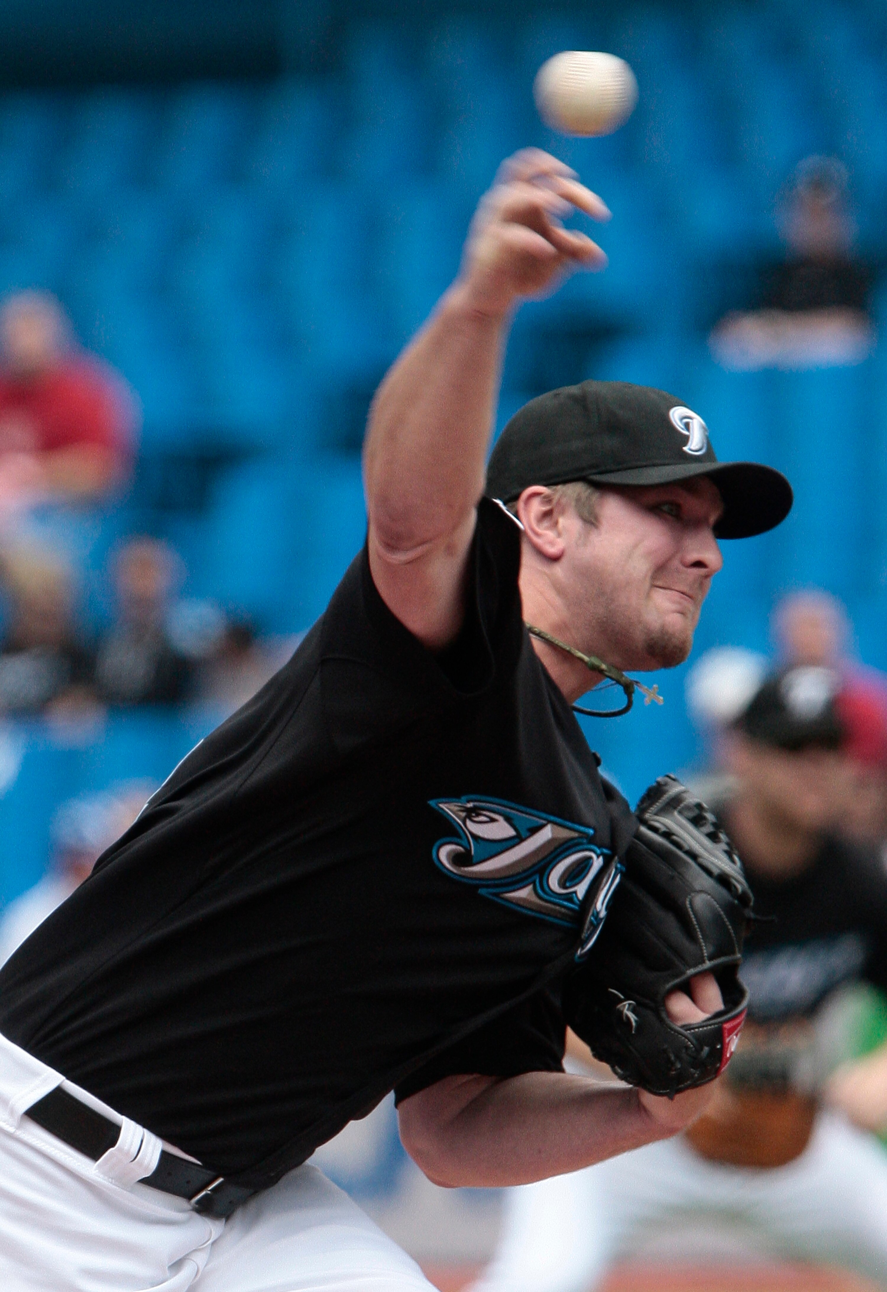 TORONTO, CANADA - JUNE 12:  Kyle Drabek #4 of the Toronto Blue Jays throws a pitch during MLB action against the Boston Red Sox at The Rogers Centre June 12, 2011 in Toronto, Ontario, Canada. (Photo by Abelimages/Getty Images)