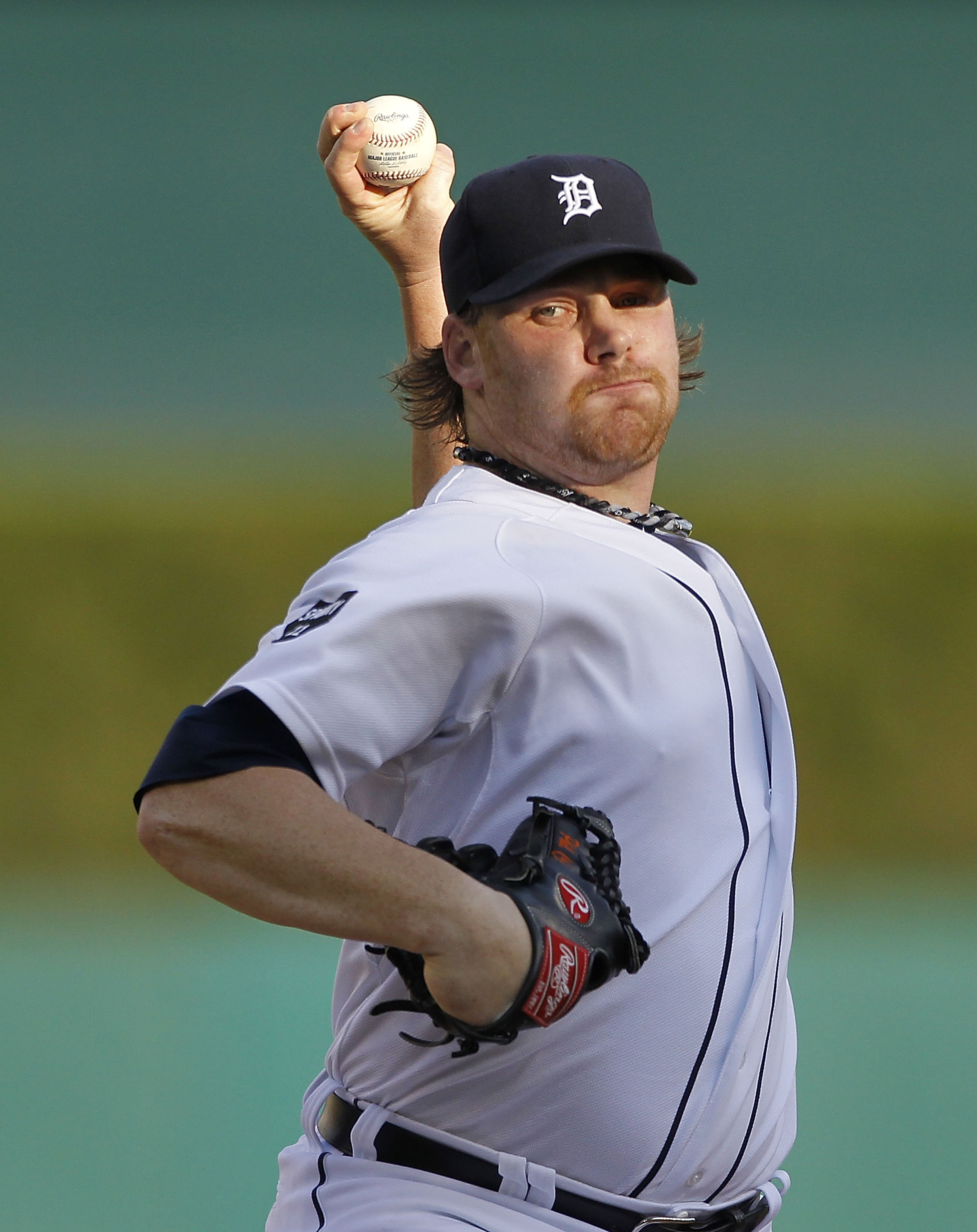 DETROIT - JUNE 13:  Phil Coke #40 of the Detroit Tigers warms up prior to the start of the first inning during the game against the Tampa Bay Rays at Comerica Park on June 13, 2011 in Detroit, Michigan.  (Photo by Leon Halip/Getty Images)