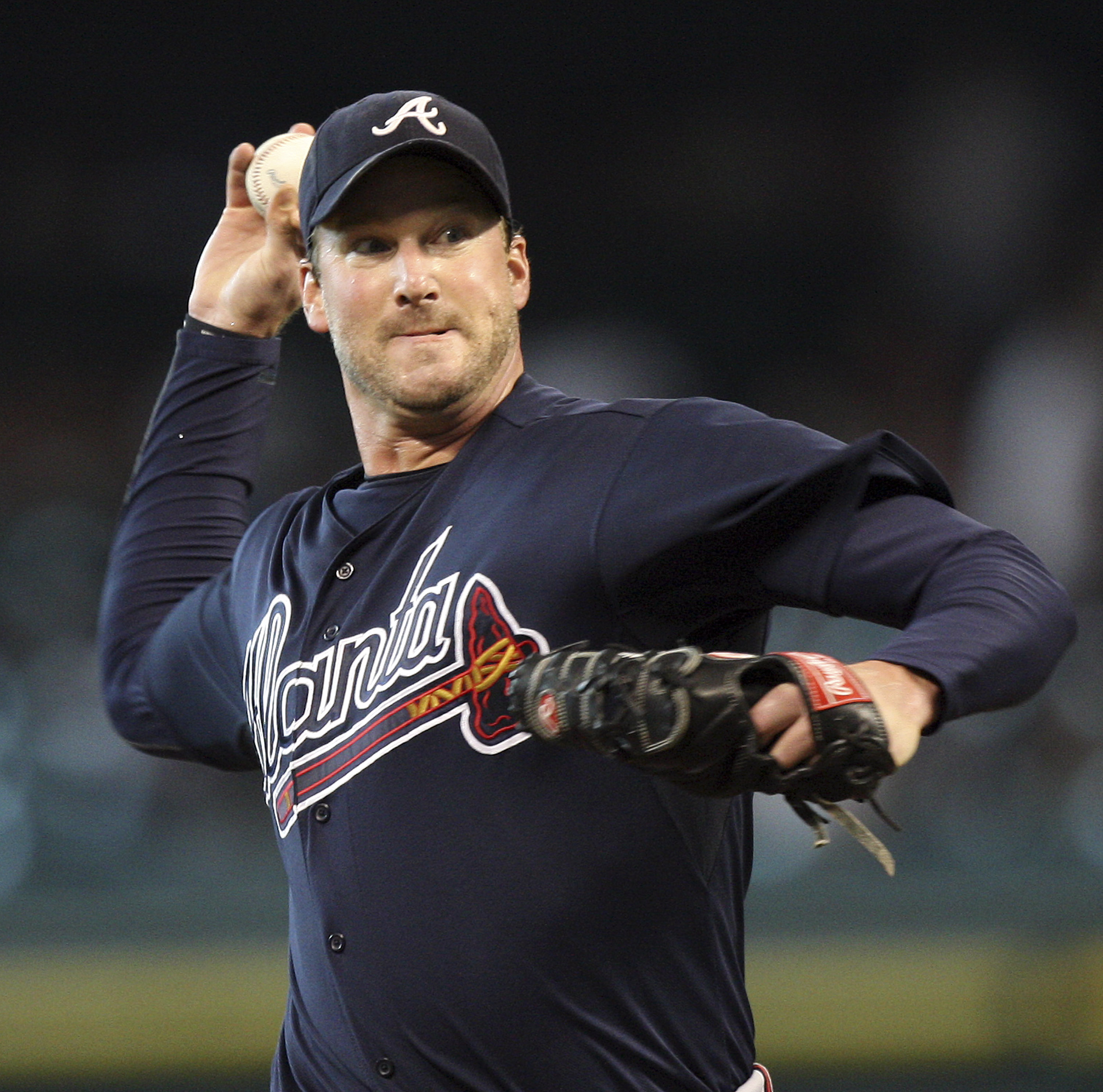 HOUSTON - JUNE 13:  Pitcher Derek Lowe #32 of the Atlanta Braves throws against the Houston Astros in the first inning at Minute Maid Park on June 13, 2011 in Houston, Texas.  (Photo by Bob Levey/Getty Images)