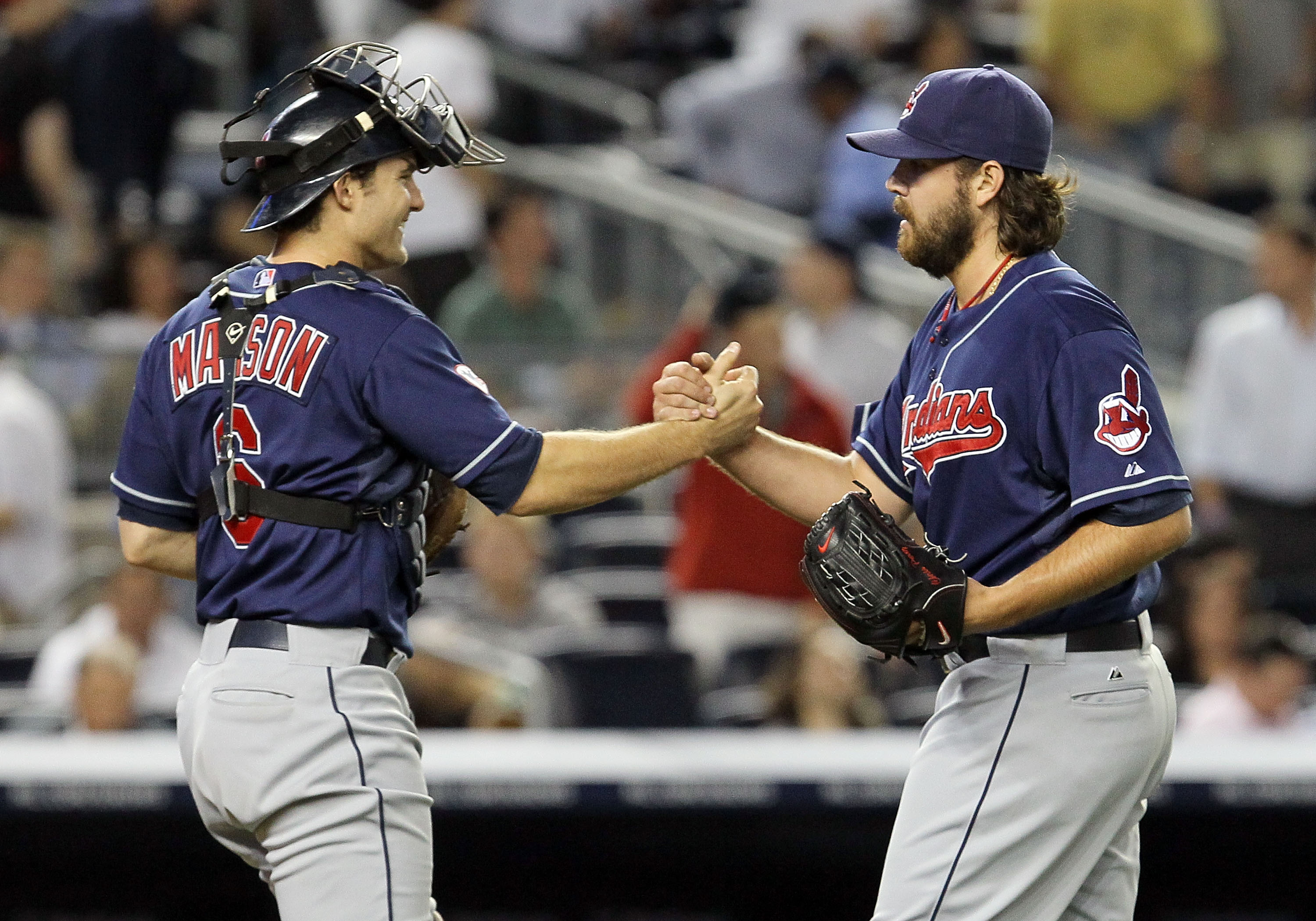 NEW YORK, NY - JUNE 13:  Chris Perez #54 and Lou Marson #6 of the Cleveland Indians celebrate  the final out of the game against the New York Yankees on June 13, 2011 at Yankee Stadium in the Bronx borough of New York City. Cleveland defeated the Yankees