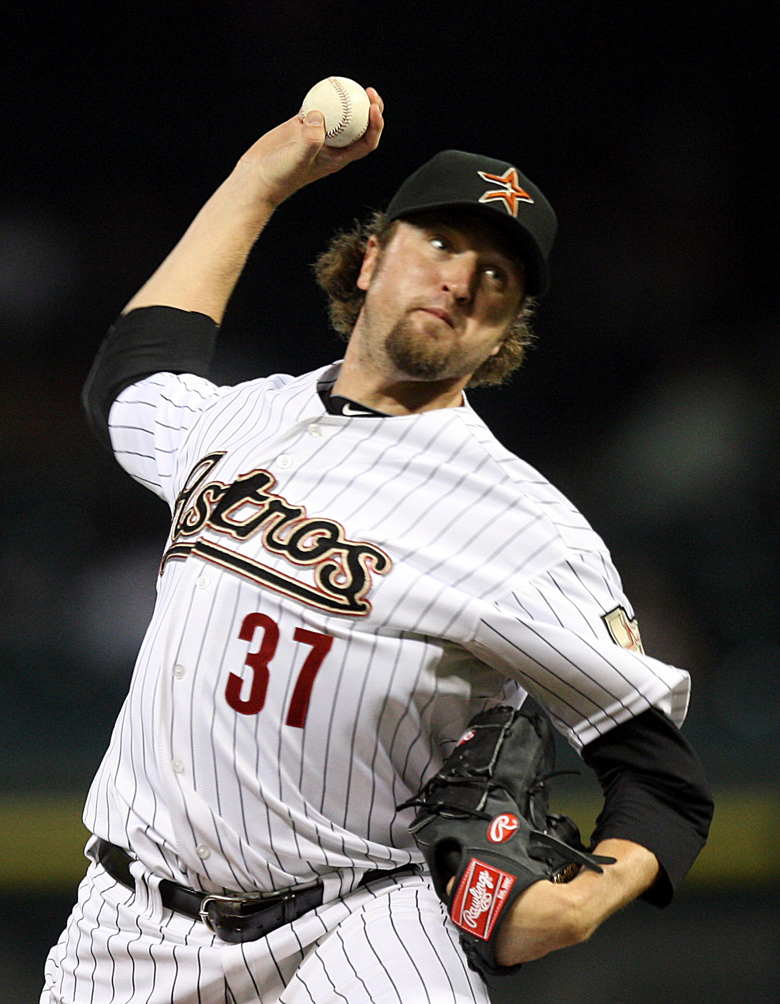 HOUSTON - JUNE 13:  Pitcher Brandon Lyon #37 of the Houston Astros throws against the Atlanta Braves in the ninth inning at Minute Maid Park on June 13, 2011 in Houston, Texas. Houston won 8-3. (Photo by Bob Levey/Getty Images)