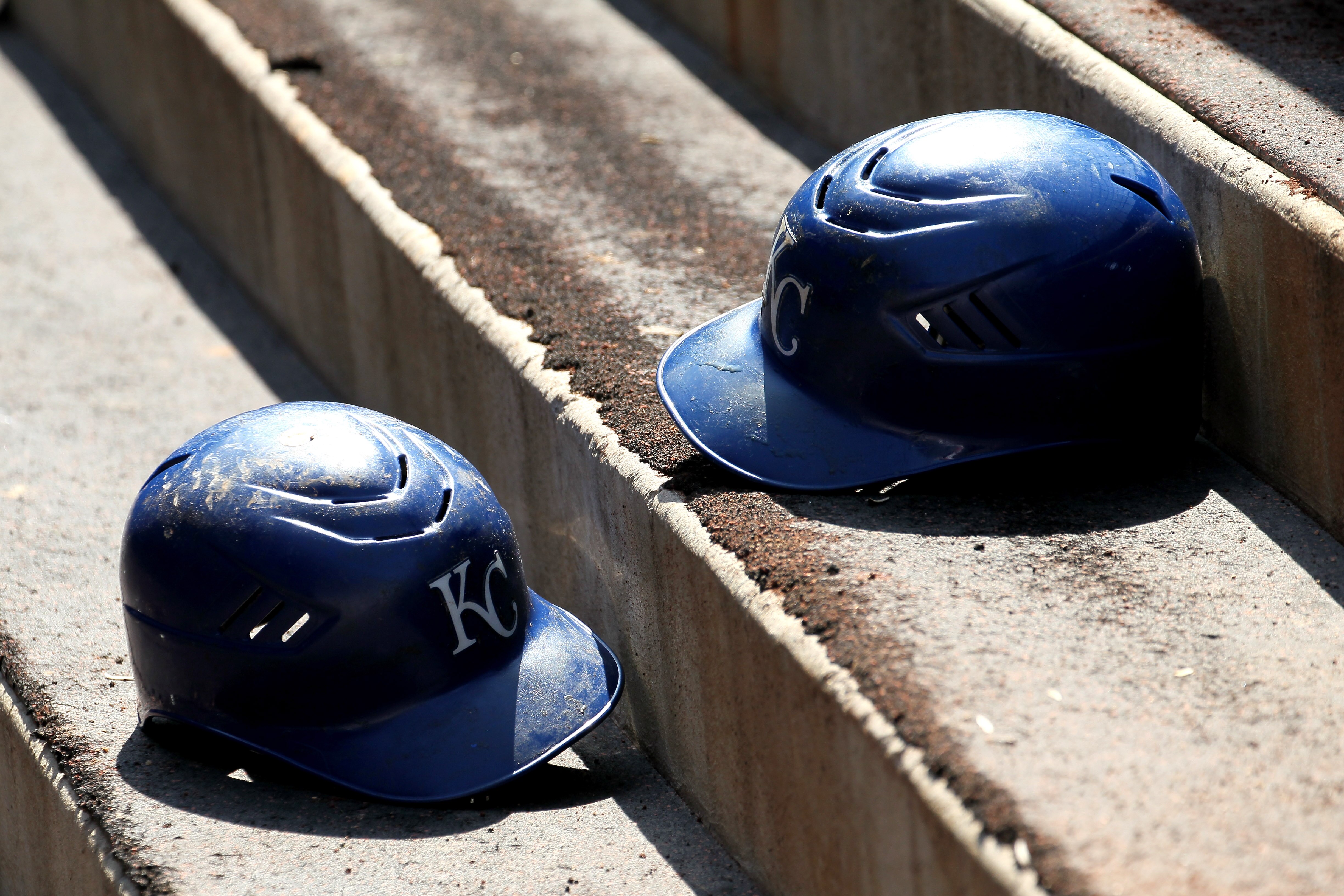 ANAHEIM, CA - JUNE 12:   Kansas City Royals batting helmets sit on the dugout steps during the game with the Los Angeles Angels of Anaheim on June 12, 2011 at Angel Stadium in Anaheim, California.  The Royals won 9-0.  (Photo by Stephen Dunn/Getty Images)