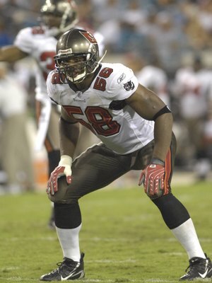 JACKSONVILLE, FL - AUGUST 18: Linebacker Quincy Black #58 of the Tampa Bay Buccaneers sets on defense against the Jacksonville Jaguars at Jacksonville  Municipal Stadium on August 18, 2007 in Jacksonville, Florida. (Photo by Al Messerschmidt/Getty Images)