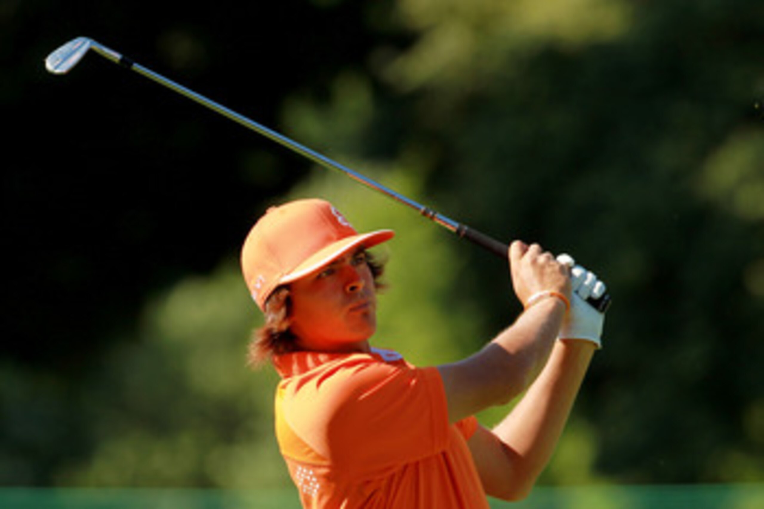 BETHESDA, MD - JUNE 13:   Rickie Fowler hits a shot during a practice round prior to the start of the 111th U.S. Open at Congressional Country Club on June 13, 2011 in Bethesda, Maryland.  (Photo by Scott Halleran/Getty Images)