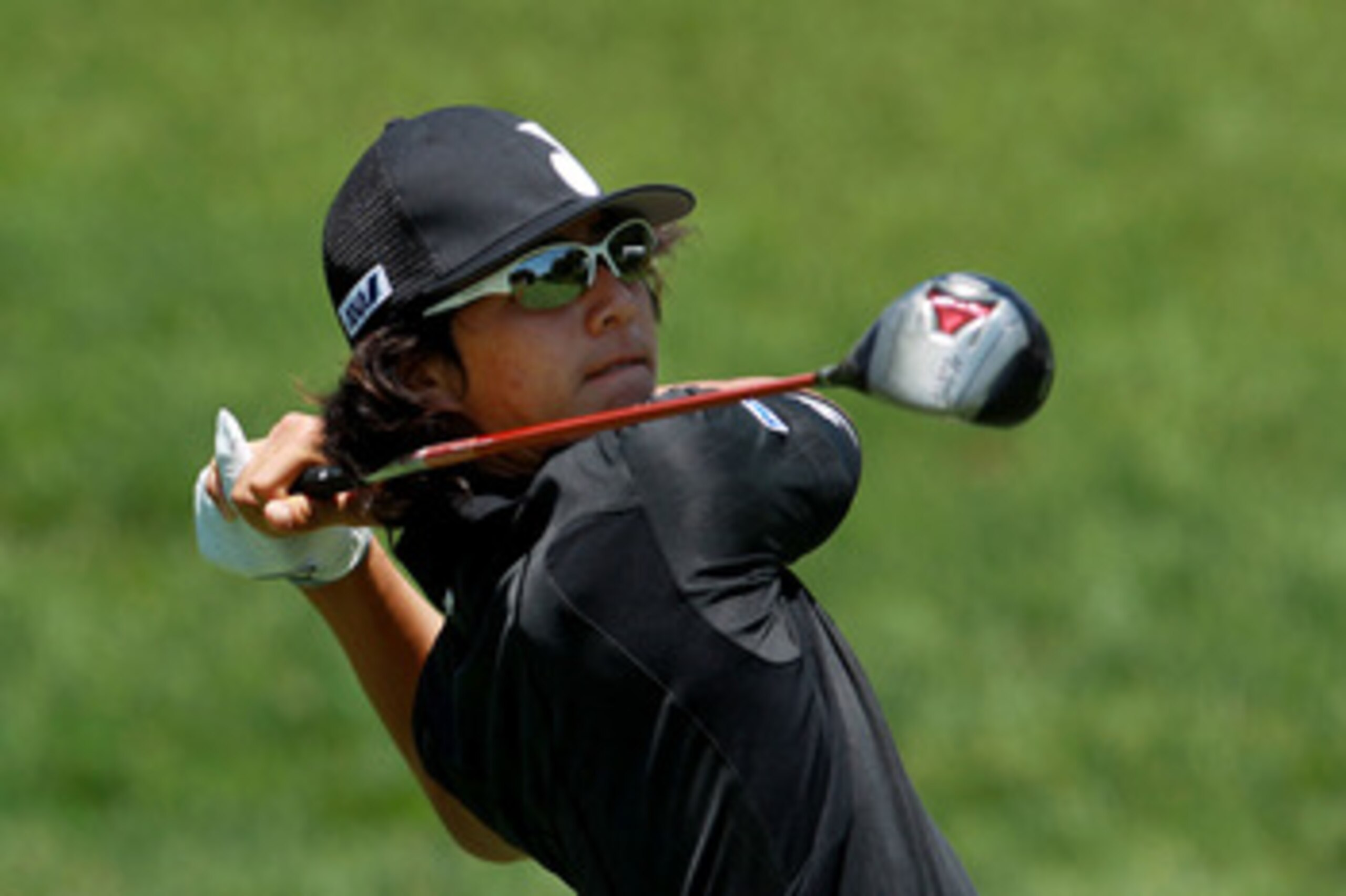 BETHESDA, MD - JUNE 13:  Ryo Ishikawa of Japan hits a tee shot during a practice round prior to the start of the 111th U.S. Open at Congressional Country Club on June 13, 2011 in Bethesda, Maryland.  (Photo by Scott Halleran/Getty Images)