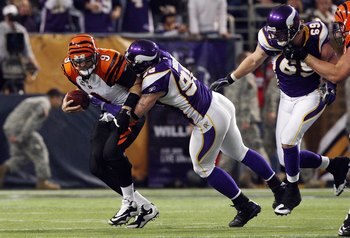 MINNEAPOLIS, MN - DECEMBER 13:  Carson Palmer #9 of the Cincinnati Bengals is sacked by Brian Robison #96 of the Minnesota Vikings on December 13, 2009 at Hubert H. Humphrey Metrodome in Minneapolis, Minnesota. (Photo by Elsa/Getty Images)  (Photo by Jim 
