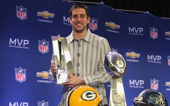 DALLAS, TX - FEBRUARY 07:  Green Bay Packers quarterback Aaron Rodgers poses with the MVP trophy after speaking to the media during a press conference at Super Bowl XLV Media Center on February 7, 2011 in Dallas, Texas.  (Photo by Streeter Lecka/Getty Ima