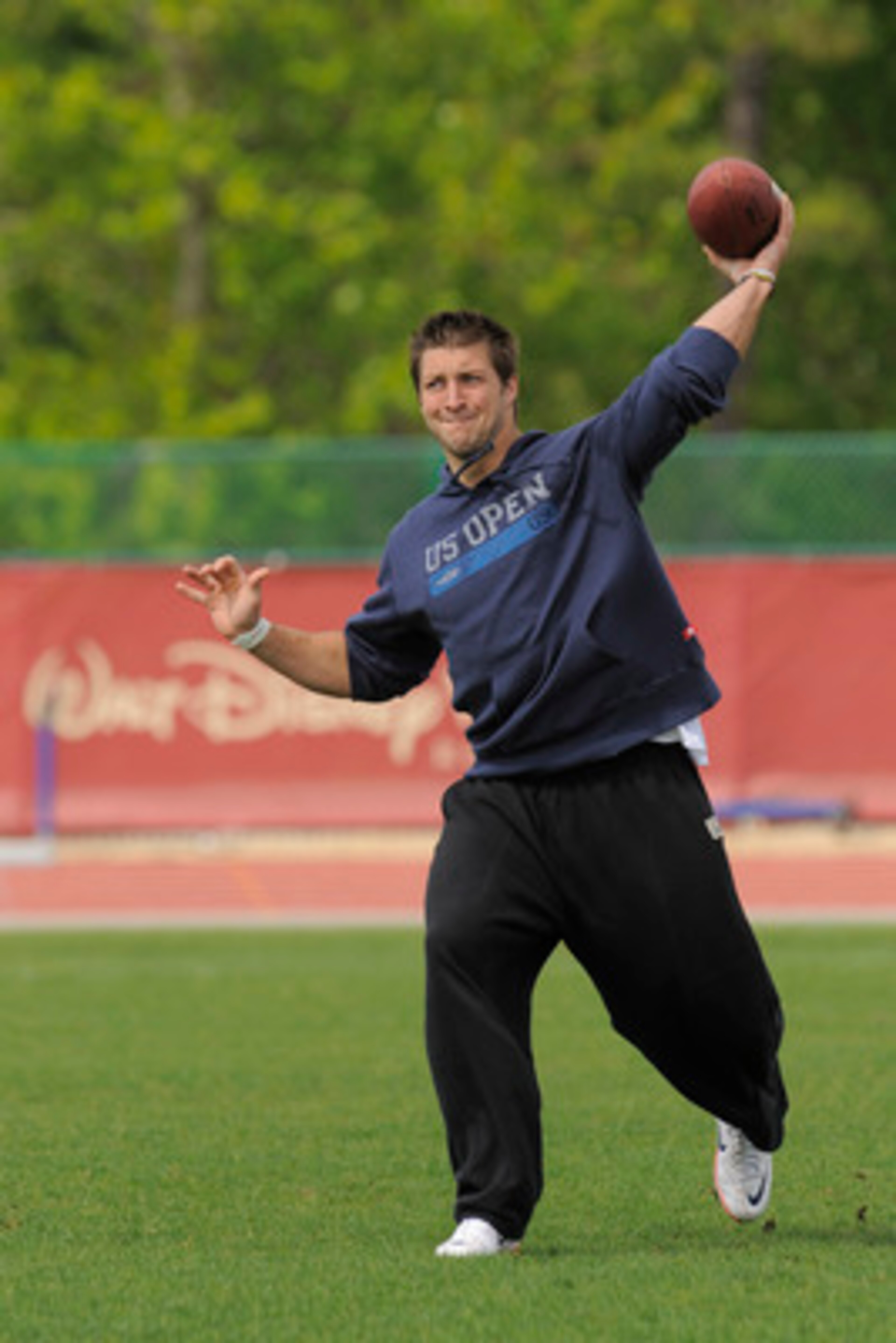 LAKE BUENA VISTA, FL - MARCH 05: In this handout photo provided by Disney Parks,  Denver Broncos quarterback Tim Tebow attends 'ESPN The Weekend' on March 05, 2011 at Disney's Hollywood Studios Park at Walt Disney World Resort in Lake Buena Vista, Florida