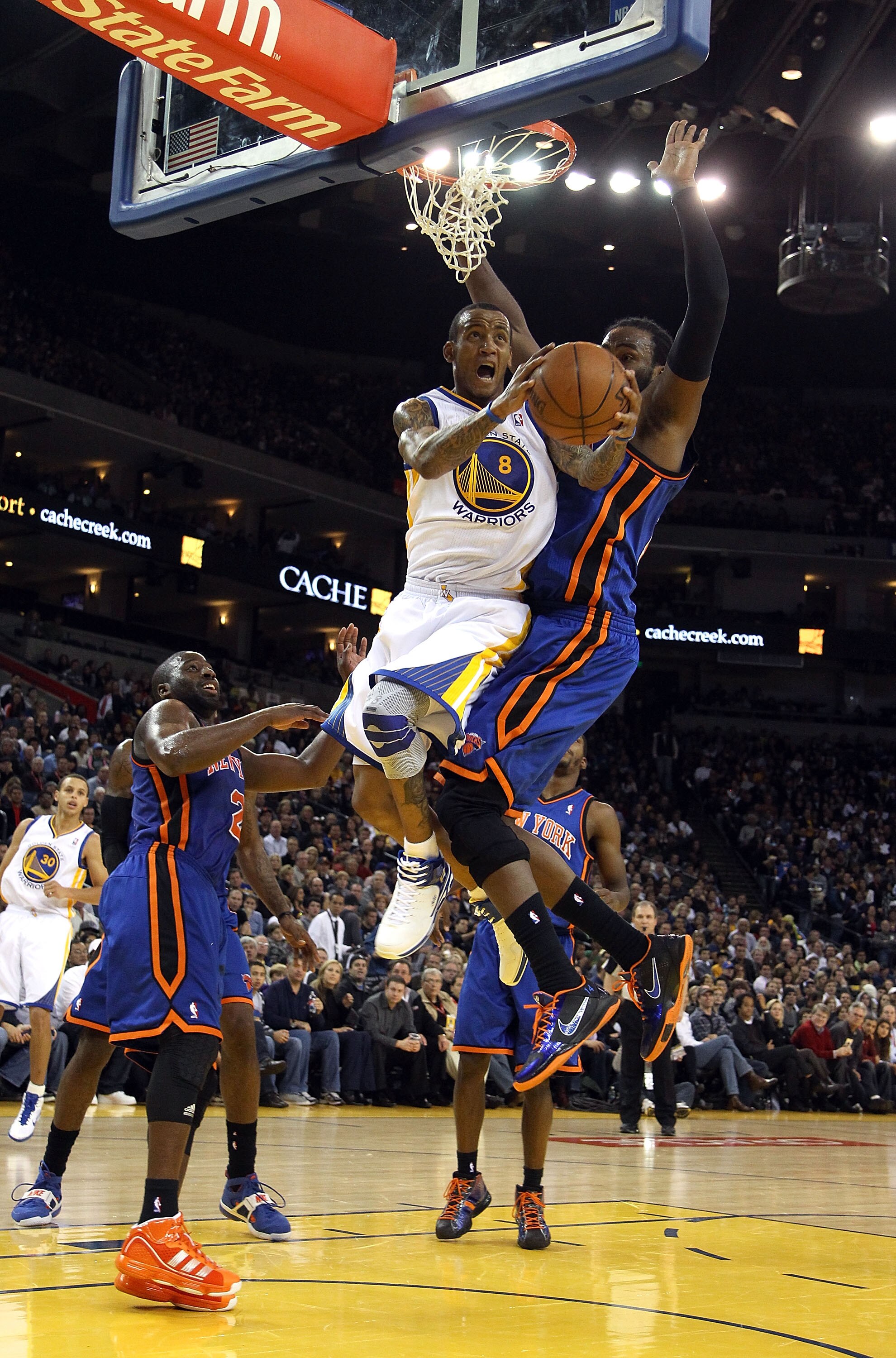 OAKLAND, CA - NOVEMBER 19:  Monta Ellis #8 of the Golden State Warriors in action against the New York Knicks at Oracle Arena on November 19, 2010 in Oakland, California. NOTE TO USER: User expressly acknowledges and agrees that, by downloading and or usi
