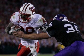 PASADENA, CA - JANUARY 01:  Running back Montee Ball #28 of the Wisconsin Badgers rushes with the ball against the TCU Horned Frogs during the 97th Rose Bowl game on January 1, 2011 in Pasadena, California.  (Photo by Stephen Dunn/Getty Images)