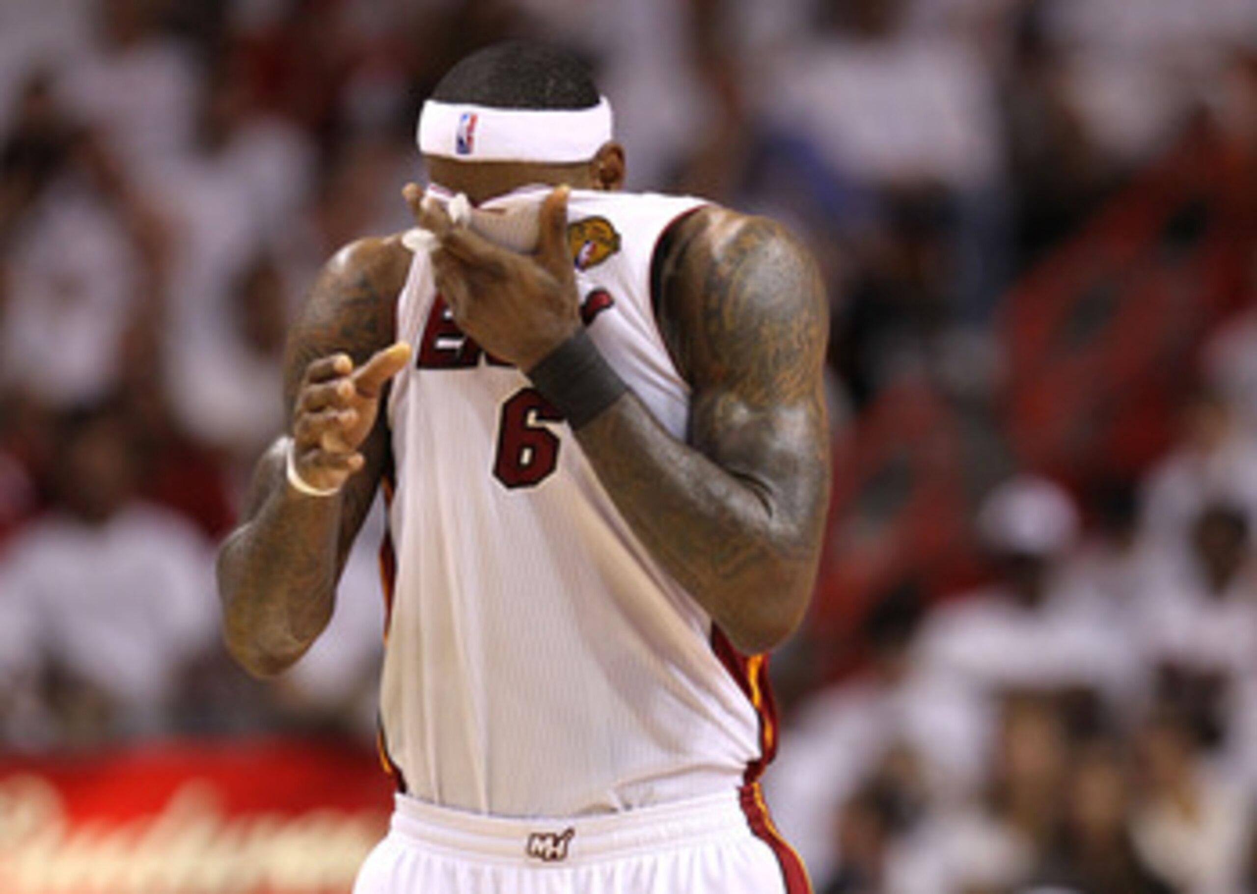 MIAMI, FL - JUNE 02:  LeBron James #6 of the Miami Heat wipes his face with his jersey against the Dallas Mavericks in Game Two of the 2011 NBA Finals at American Airlines Arena on June 2, 2011 in Miami, Florida. NOTE TO USER: User expressly acknowledges