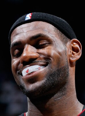 ATLANTA - OCTOBER 21:  LeBron James #6 of the Miami Heat enjoys a laugh after a timeout against the Atlanta Hawks at Philips Arena on October 21, 2010 in Atlanta, Georgia.  (Photo by Kevin C. Cox/Getty Images)