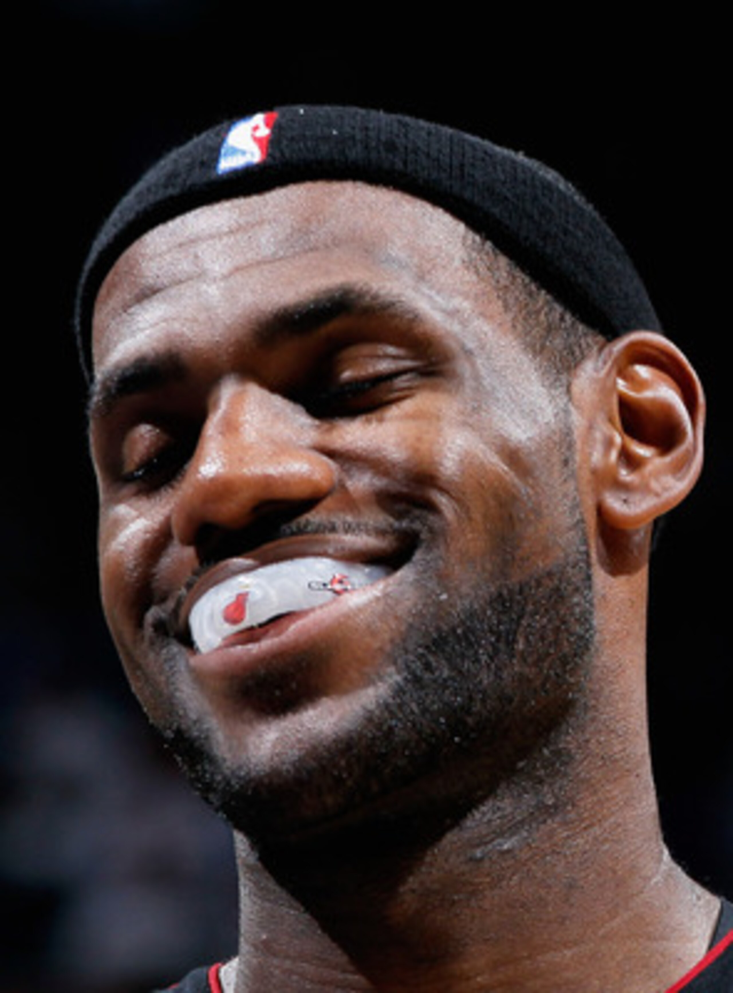 ATLANTA - OCTOBER 21:  LeBron James #6 of the Miami Heat enjoys a laugh after a timeout against the Atlanta Hawks at Philips Arena on October 21, 2010 in Atlanta, Georgia.  (Photo by Kevin C. Cox/Getty Images)