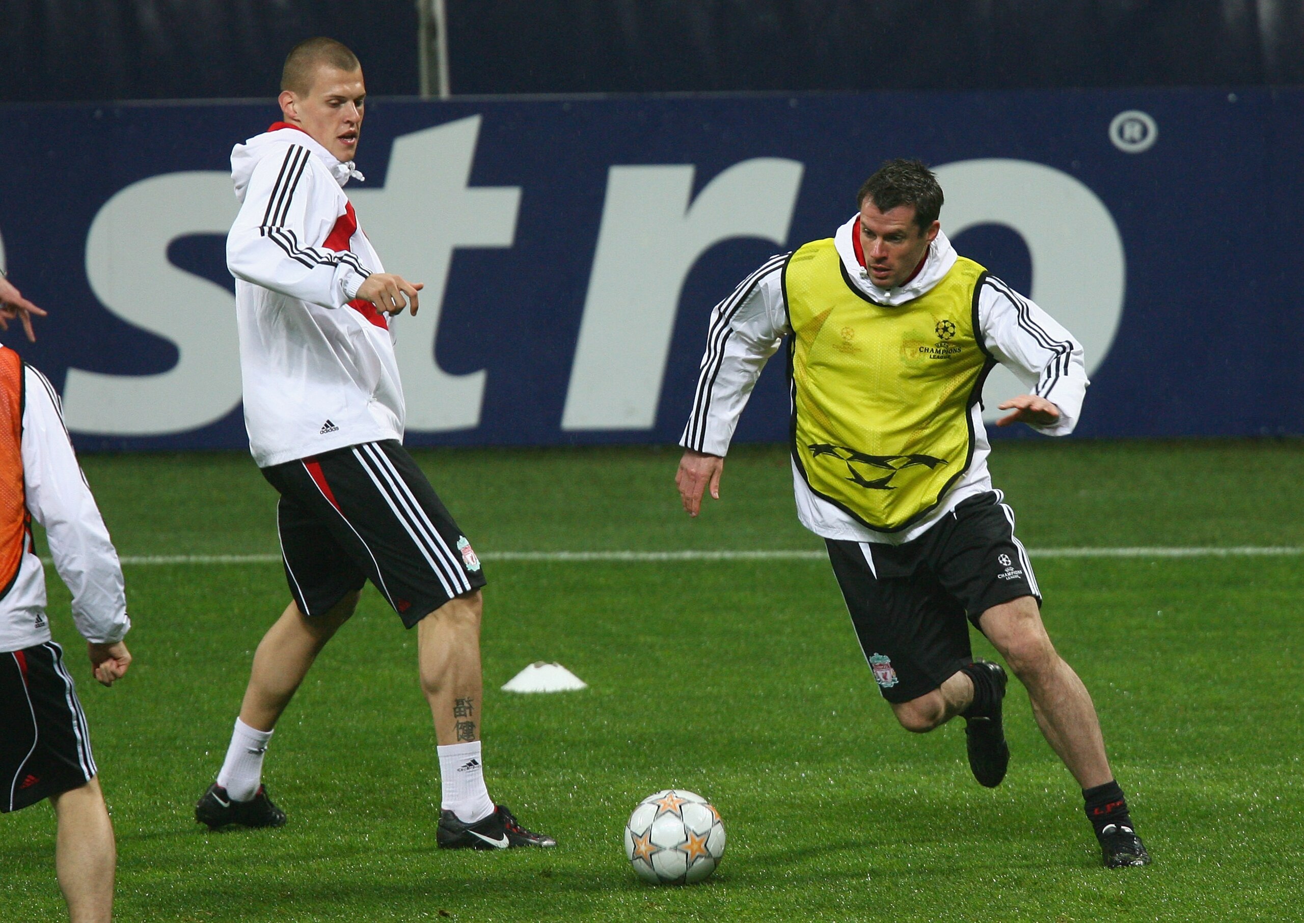 MILAN, ITALY - MARCH 10:  Jamie Carragher of Liverpool beats Martin Skrtel during the Liverpool training session ahead of their UEFA Champions League match against Inter Milan tomorrow night held at the San Siro Stadium on March 10, 2008 in Milan, Italy.