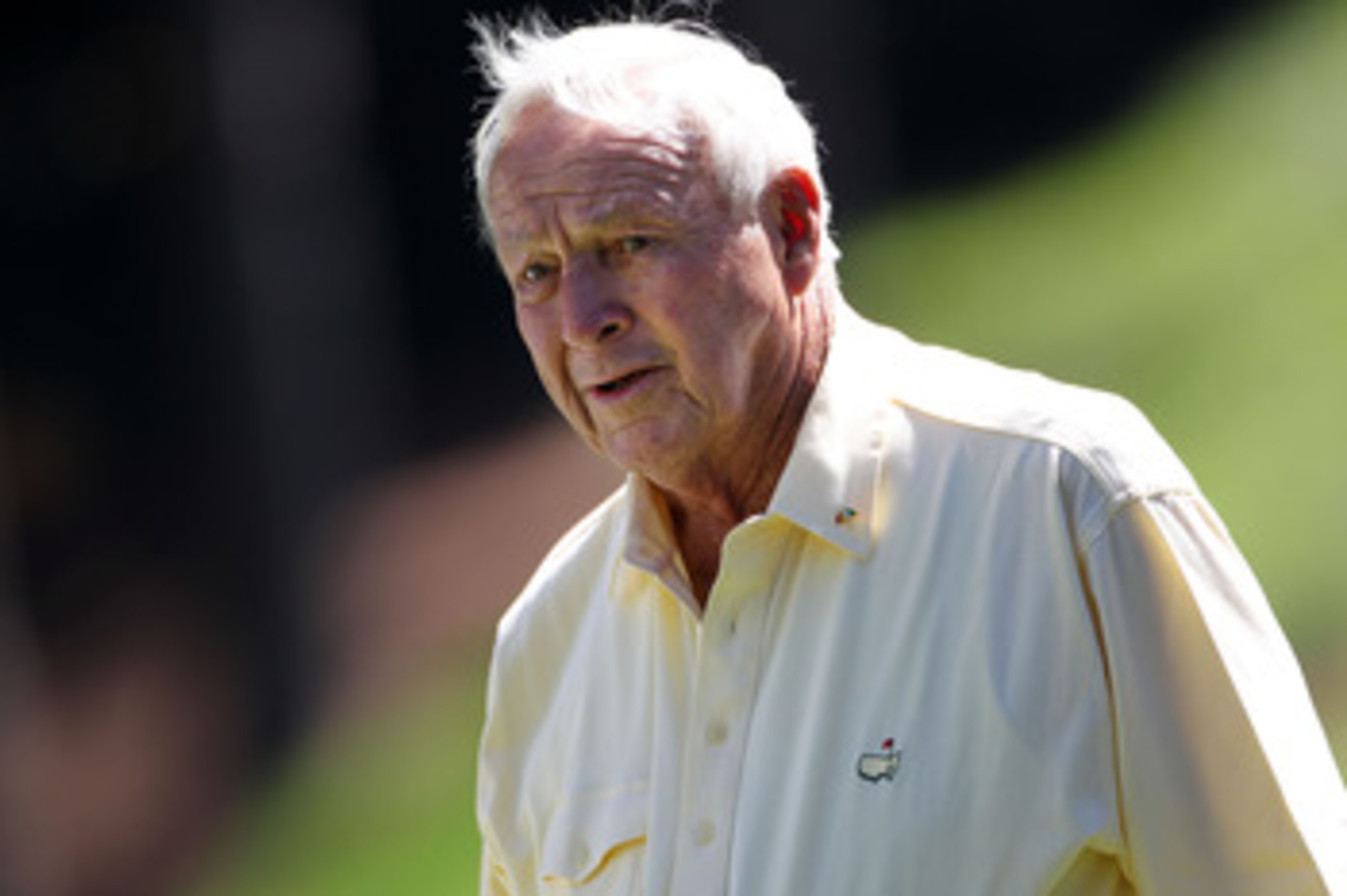 AUGUSTA, GA - APRIL 06:  Arnold Palmer walks across a green during the Par 3 Contest prior to the 2011 Masters Tournament at Augusta National Golf Club on April 6, 2011 in Augusta, Georgia.  (Photo by Jamie Squire/Getty Images)