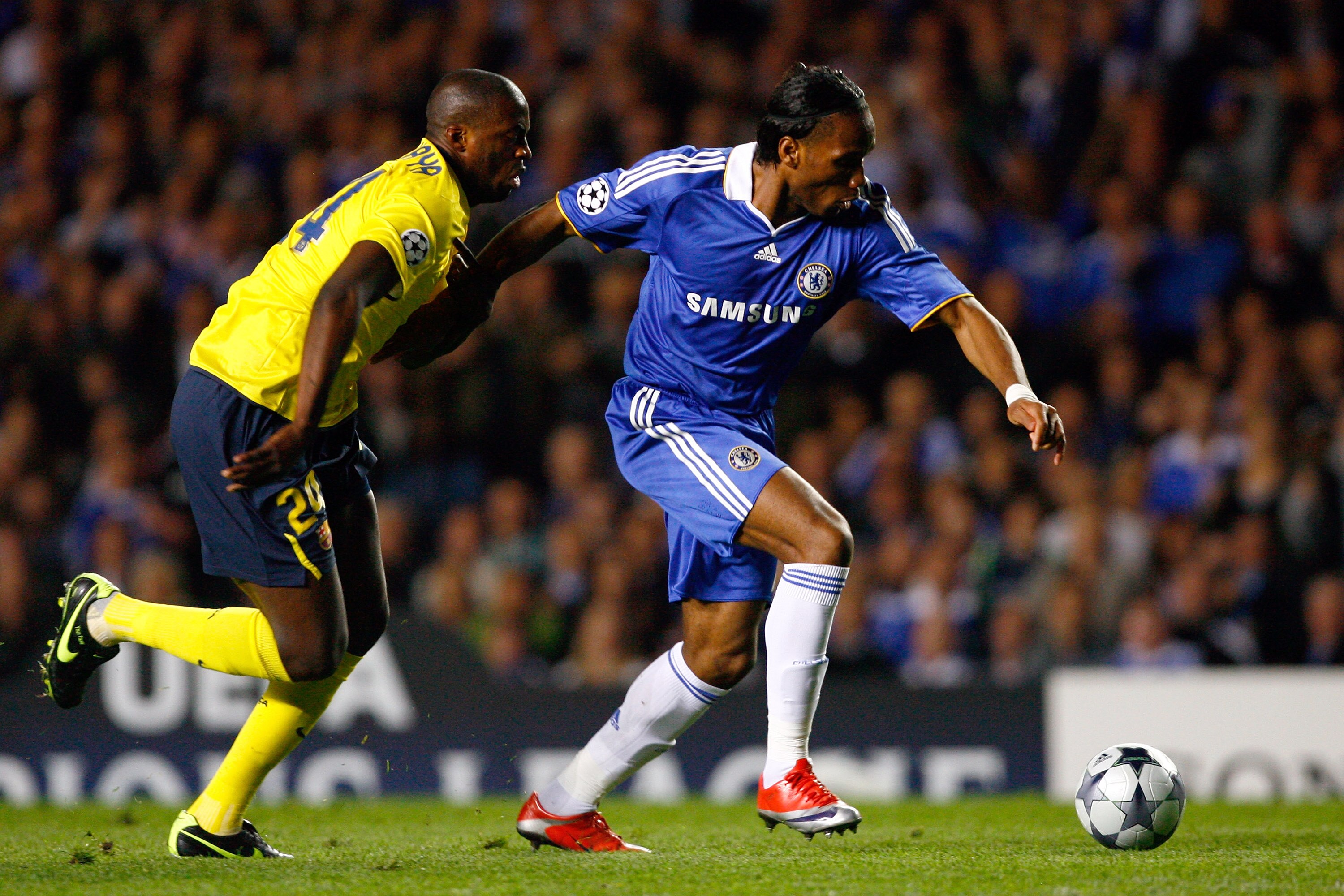 LONDON, ENGLAND - MAY 06:  Yaya Toure of Barcelona battles for the ball with Didier Drogba of Chelsea during the UEFA Champions League Semi Final Second Leg match between Chelsea and Barcelona at Stamford Bridge on May 6, 2009 in London, England.  (Photo