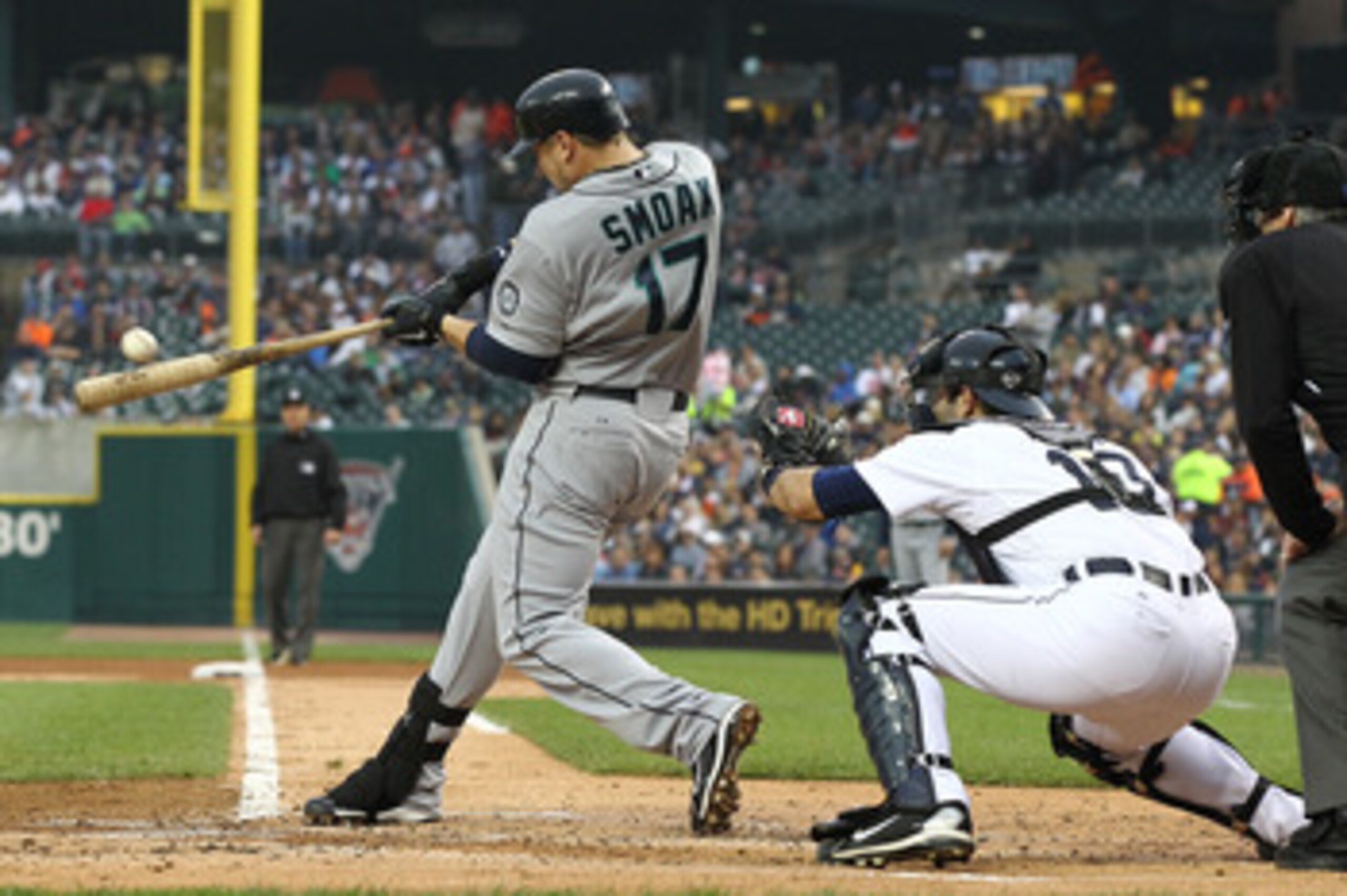 DETROIT, MI - JUNE 10:  First Baseman Justin Smoak #17 of the Seattle Mariners makes contact on a pitch during a MLB game against the Detroit Tigers at Comerica Park on June 10, 2011 in Detroit, Michigan.  Seattle defeated Detroit 3-2.  (Photo by Dave Reg