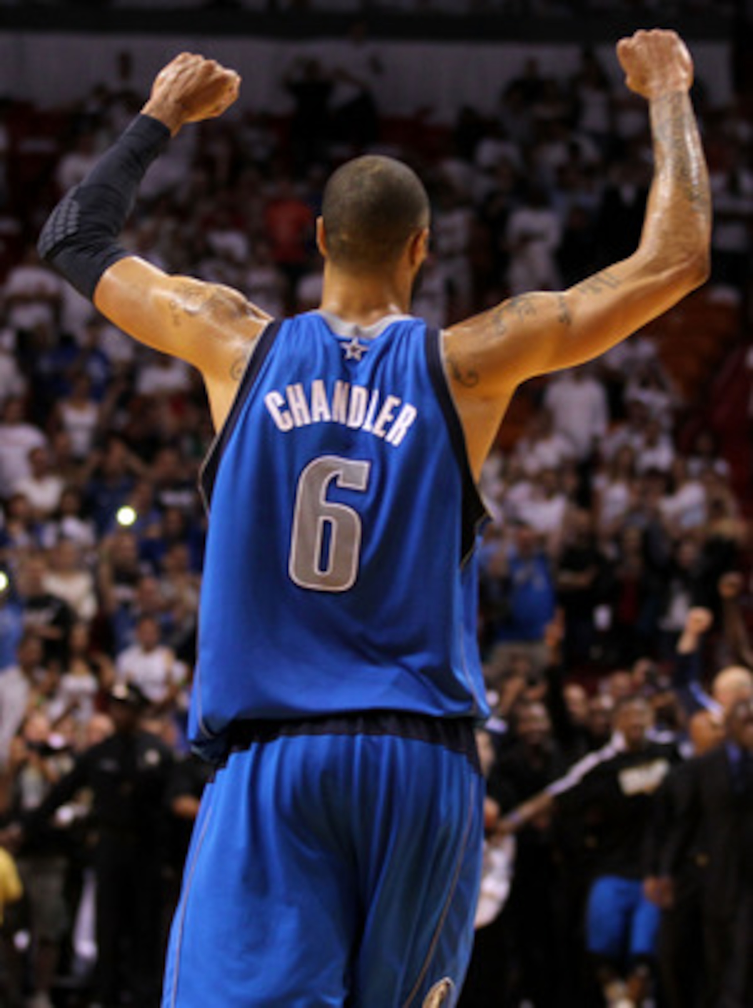 MIAMI, FL - JUNE 12:  Tyson Chandler #6 of the Dallas Mavericks celebrates after the Mavricks won 105-95 against the Miami Heat in Game Six of the 2011 NBA Finals at American Airlines Arena on June 12, 2011 in Miami, Florida. NOTE TO USER: User expressly 