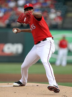 ARLINGTON, TX - JUNE 08:  Pitcher Alexi Ogando #41 of the Texas Rangers throws against the Detroit Tigers at Rangers Ballpark in Arlington on June 8, 2011 in Arlington, Texas.  (Photo by Ronald Martinez/Getty Images)