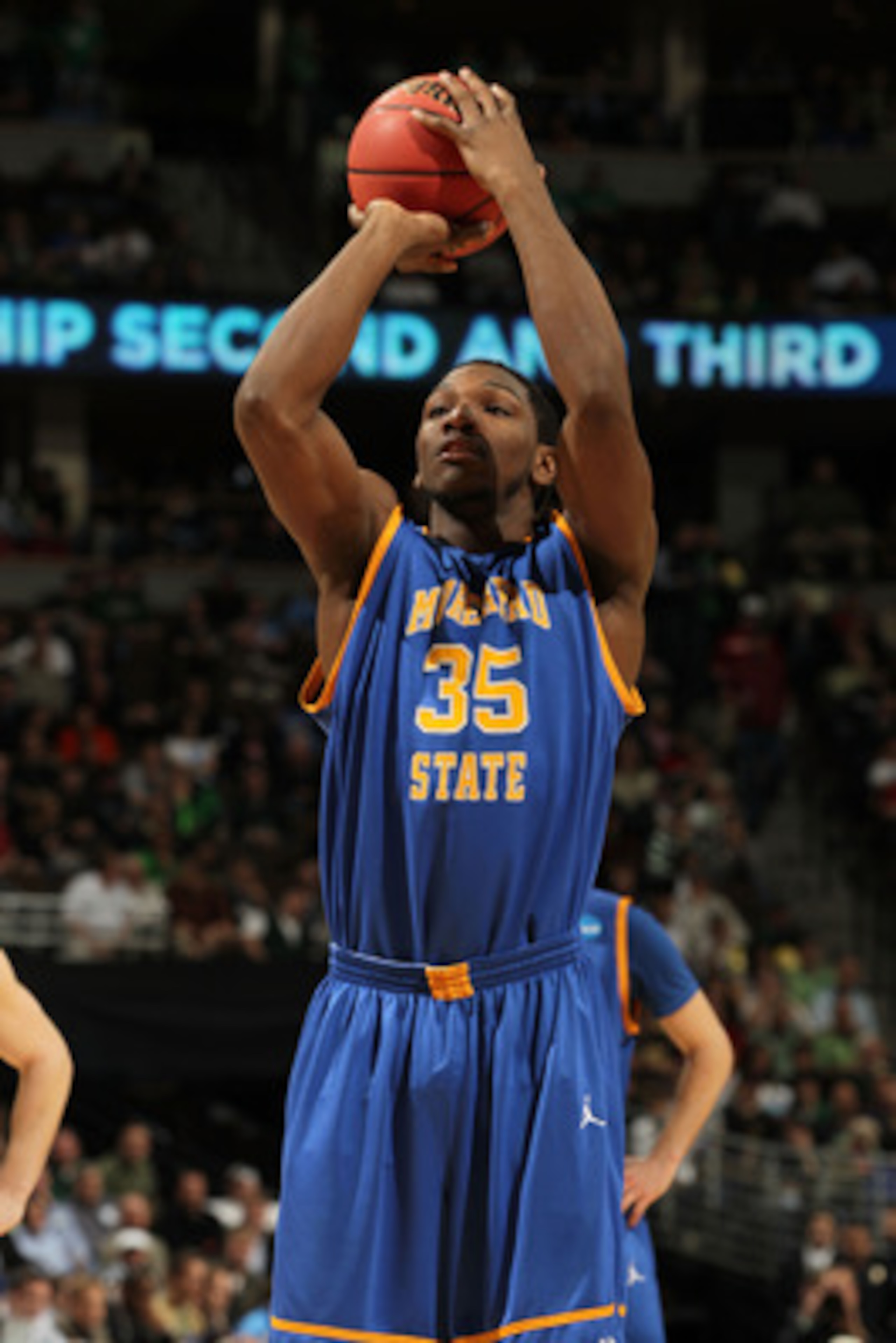 DENVER, CO - MARCH 17:  Kenneth Faried #35 of the Morehead State Eagles shoots a free throw against the Louisville Cardinals during the second round of the 2011 NCAA men's basketball tournament at Pepsi Center on March 17, 2011 in Denver, Colorado.  (Phot
