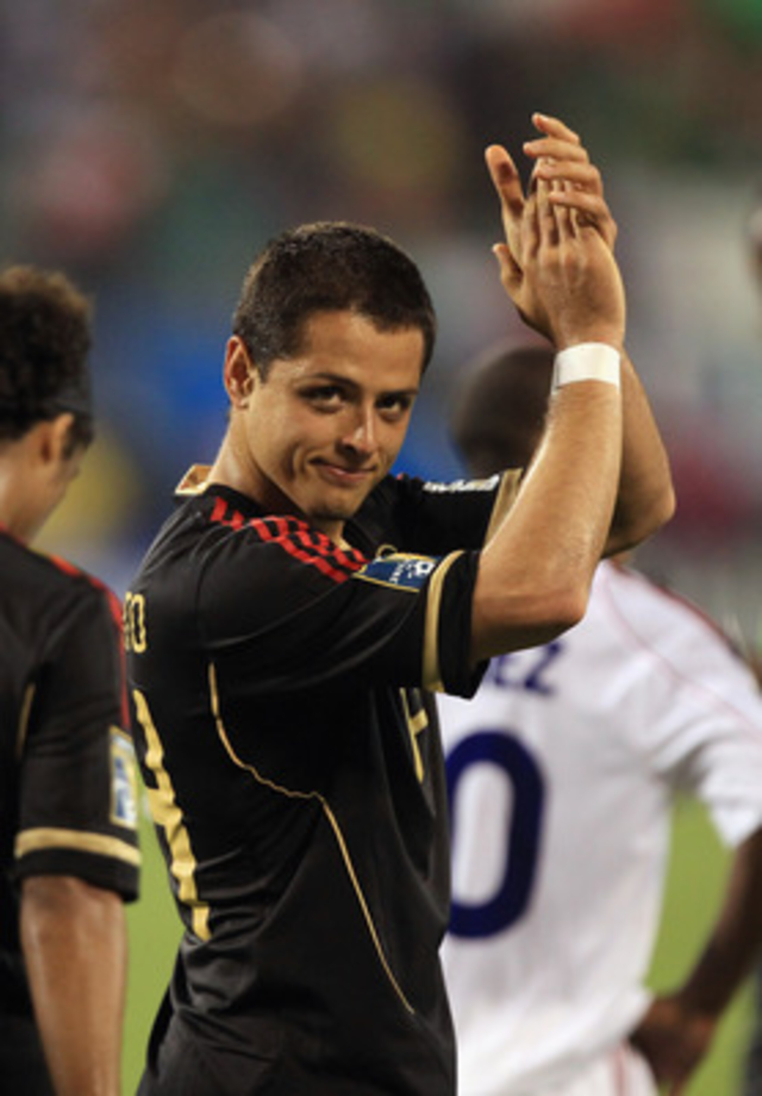 CHARLOTTE, NC - JUNE 09:  Javier Hernandez #14 of Mexico celebrates after scoring a goal against Cuba during their game in the CONCACAF Gold Cup at Bank of America Stadium on June 9, 2011 in Charlotte, North Carolina.  (Photo by Streeter Lecka/Getty Image