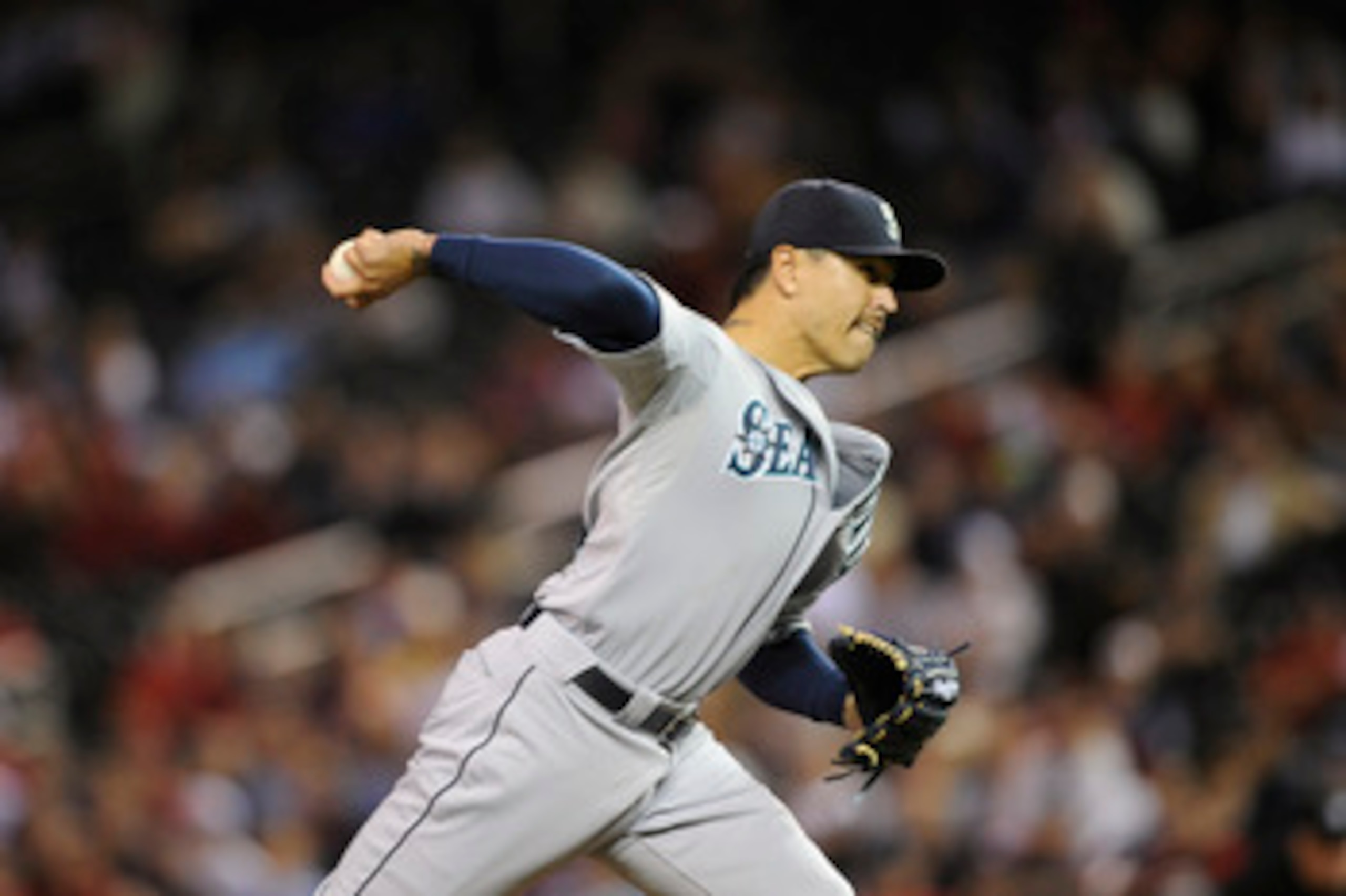 MINNEAPOLIS, MN - MAY 23: Brandon League #43 of the Seattle Mariners pitches against the Minnesota Twins during their game on May 23, 2011 at Target Field in Minneapolis, Minnesota. The Rockies won 6-5. (Photo by Hannah Foslien/Getty Images)