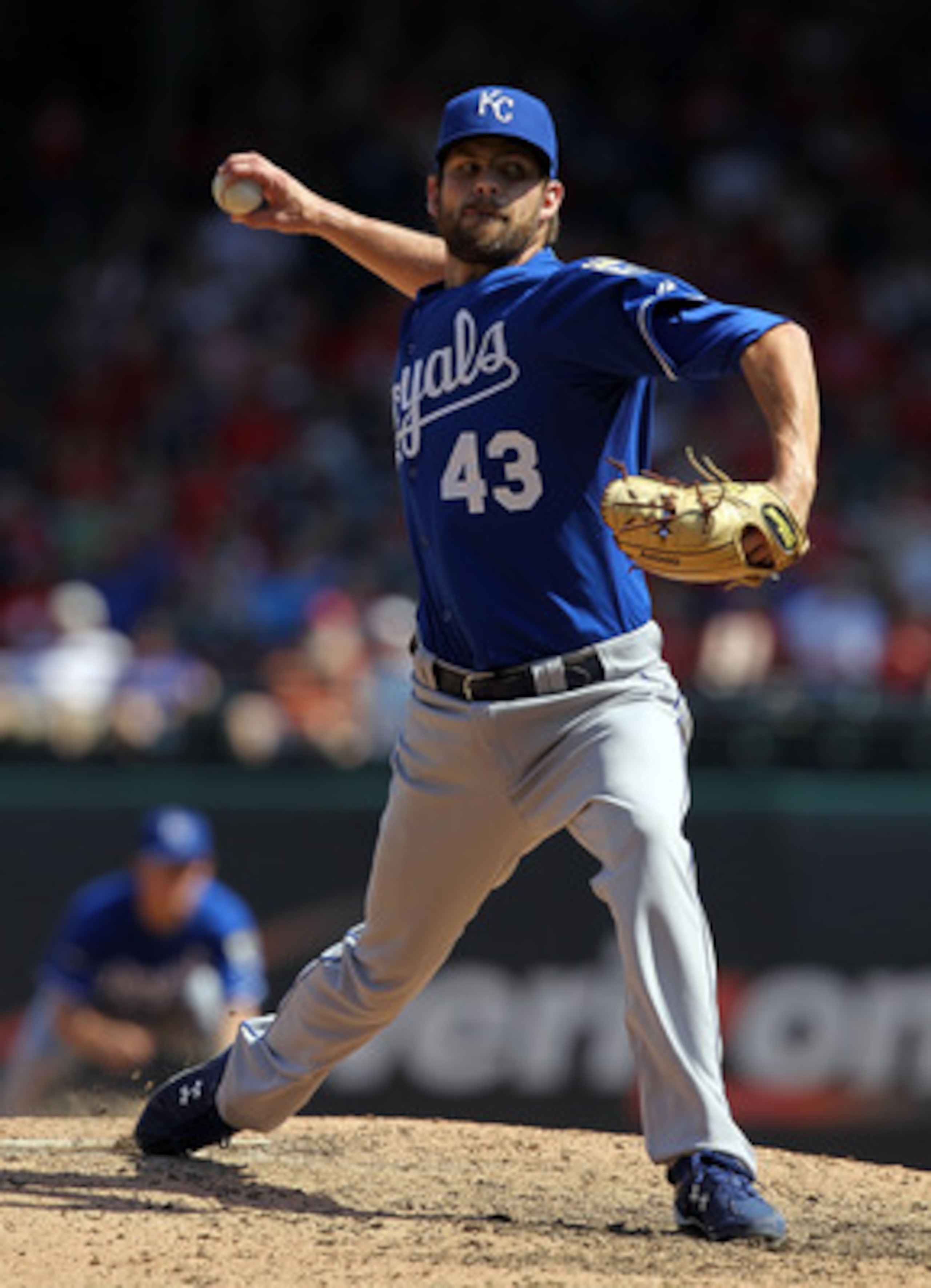 ARLINGTON, TX - MAY 29:  Aaron Crow #43 of the Kansas City Royals throws against the Texas Rangers at Rangers Ballpark in Arlington on May 29, 2011 in Arlington, Texas.  (Photo by Ronald Martinez/Getty Images)