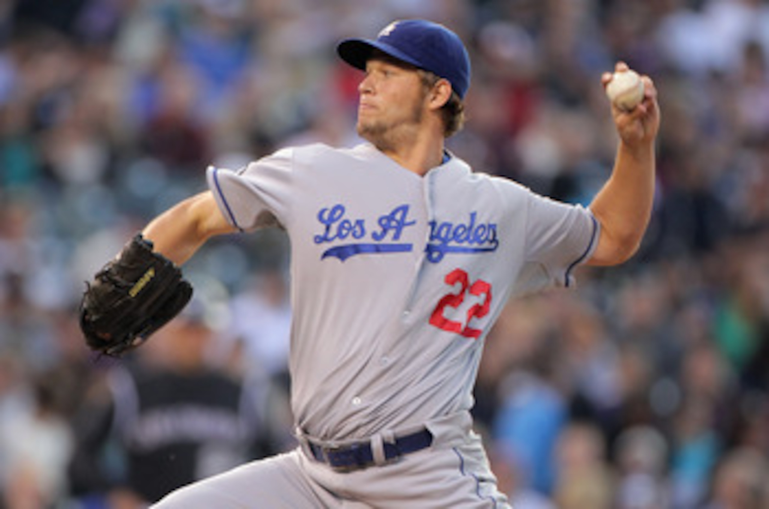 DENVER, CO - JUNE 09:  Starting pitcher Clayton Kershaw #22 of the Los Angeles Dodgers delivers against the Colorado Rockies at Coors Field on June 9, 2011 in Denver, Colorado.  (Photo by Doug Pensinger/Getty Images)