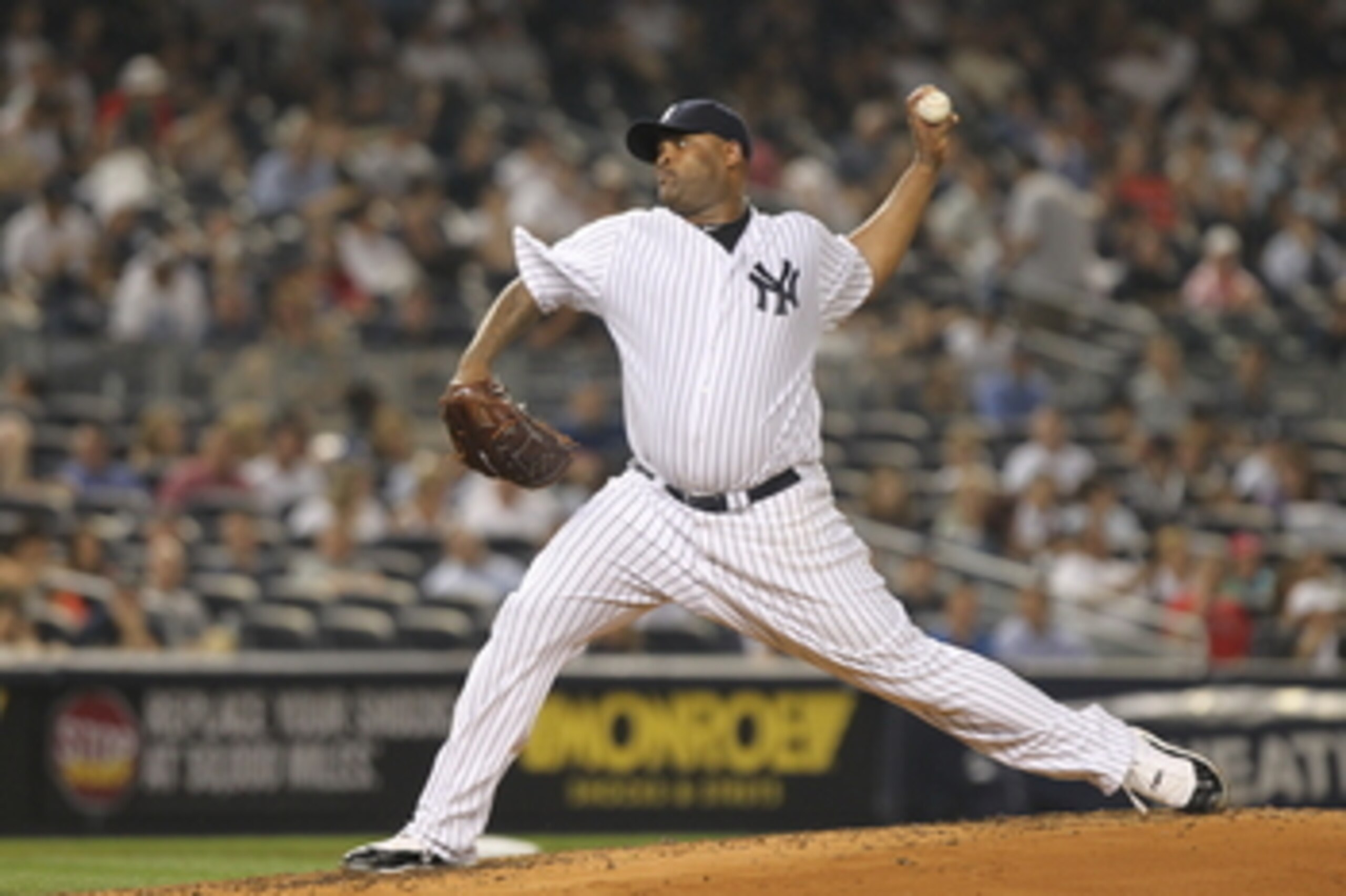 NEW YORK, NY - JUNE 09:  CC Sabathia #52 of the New York Yankees pitches against the Boston Red Sox on June 9, 2011 at Yankee Stadium in the Bronx borough of New York City.  (Photo by Nick Laham/Getty Images)
