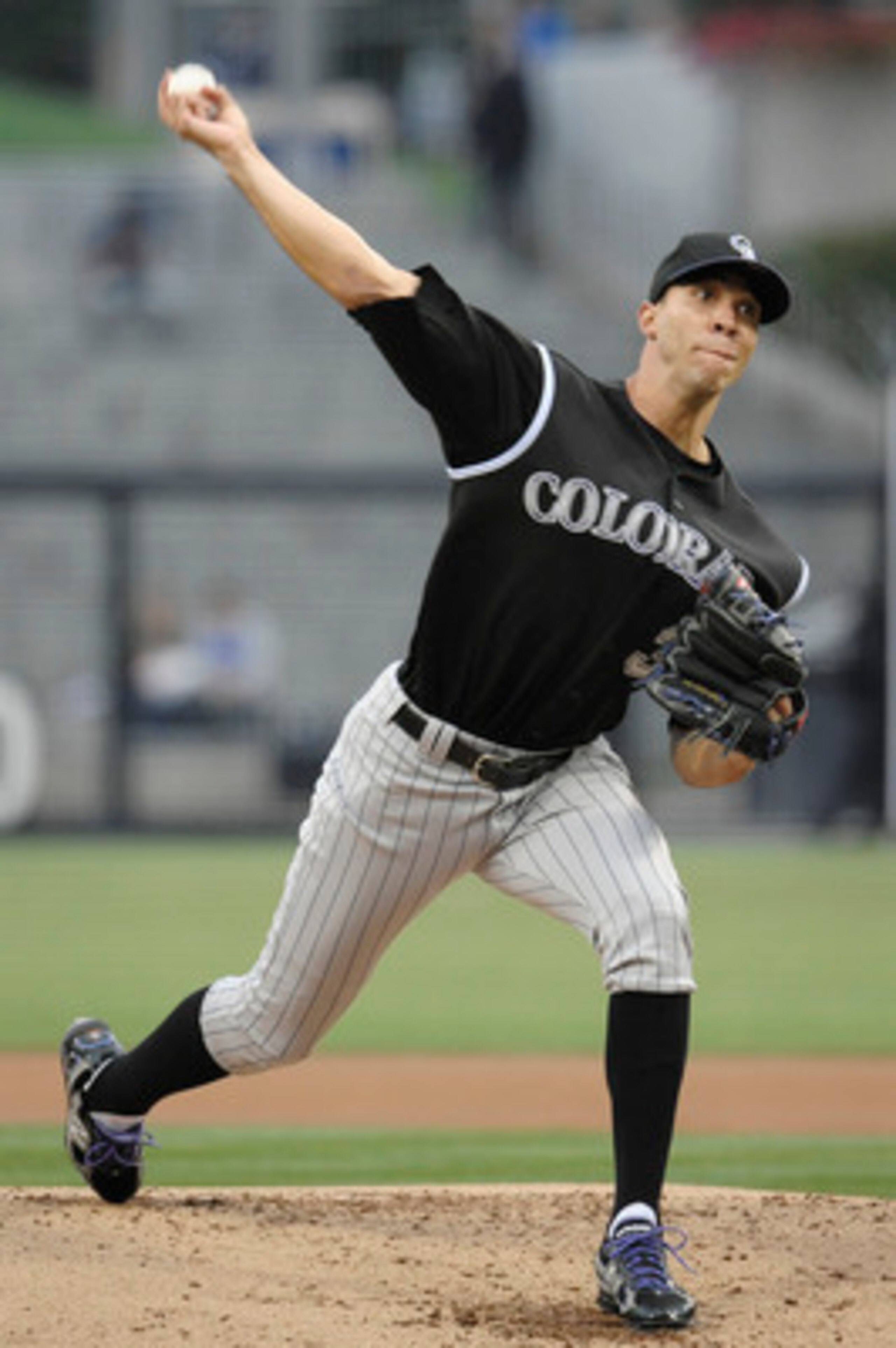 SAN DIEGO, CA - JUNE 7: Ubaldo Jimenez #38 of the Colorado Rockies pitches during the first inning of a baseball game against the San Diego Padres at Petco Park on June 7, 2011 in San Diego, California.  (Photo by Denis Poroy/Getty Images)